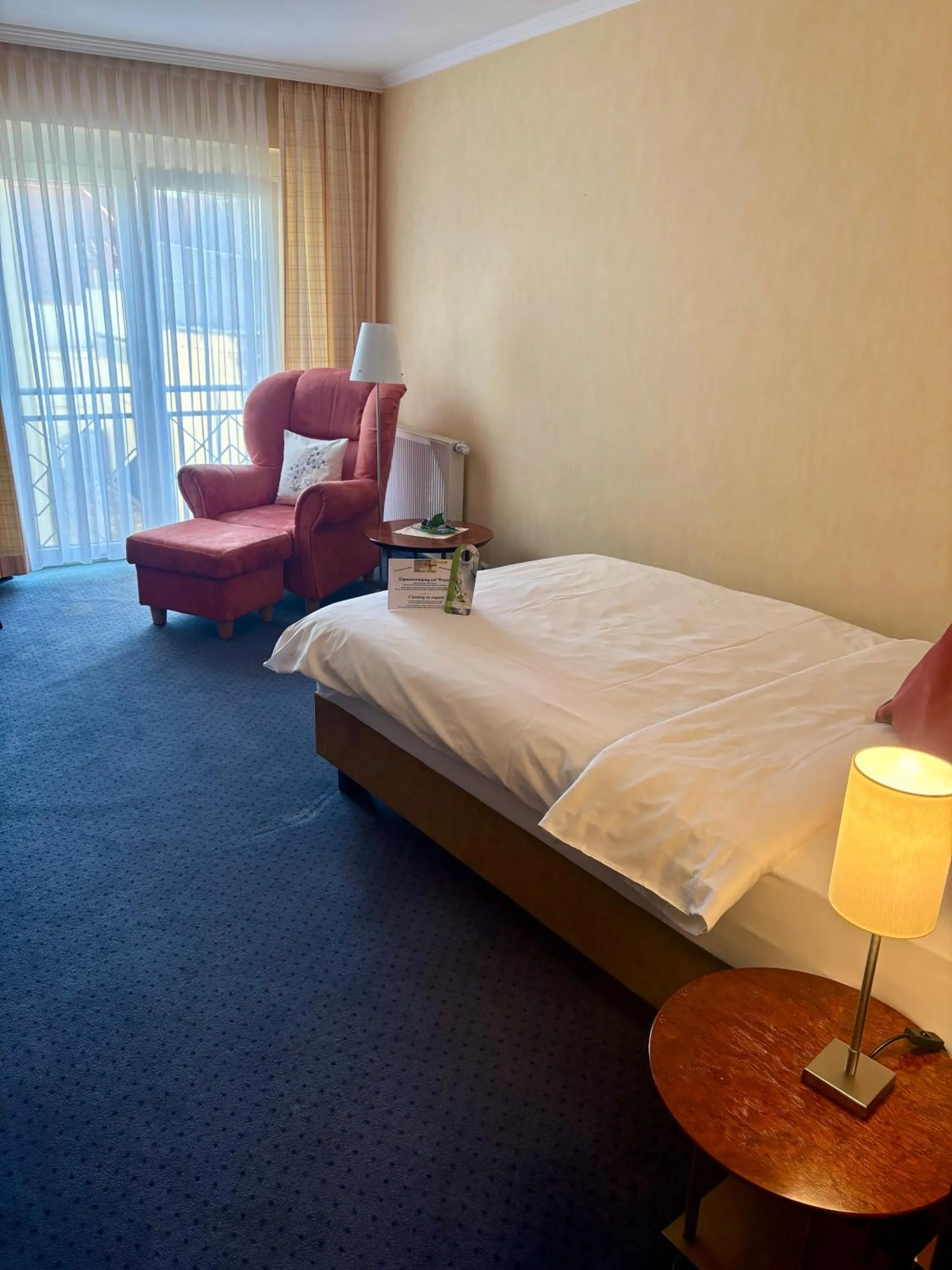 Photo of the whole room, Bed in Akzent Hotel Höltje