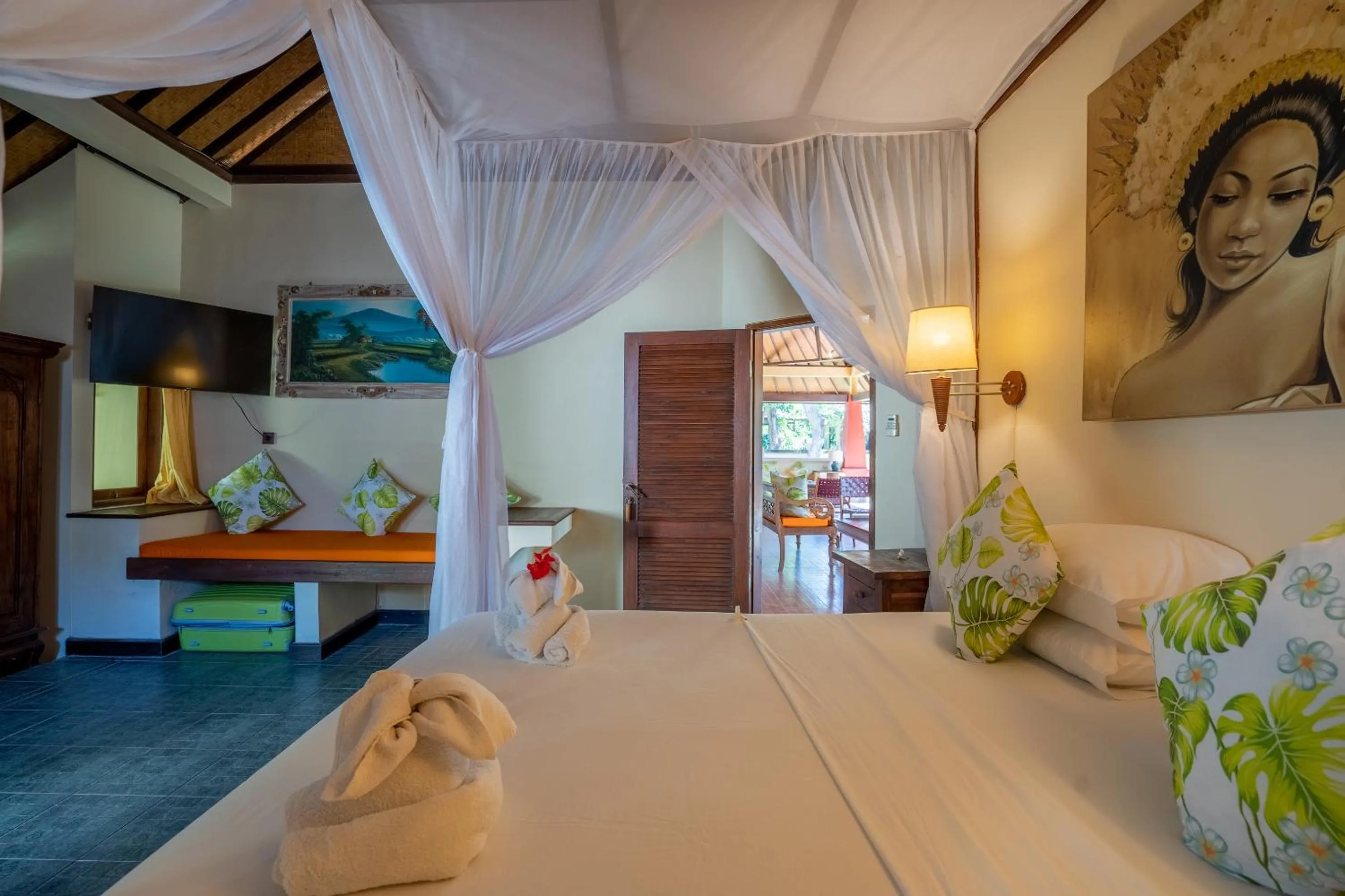 Bed in Taman Sari Bali Resort and Spa