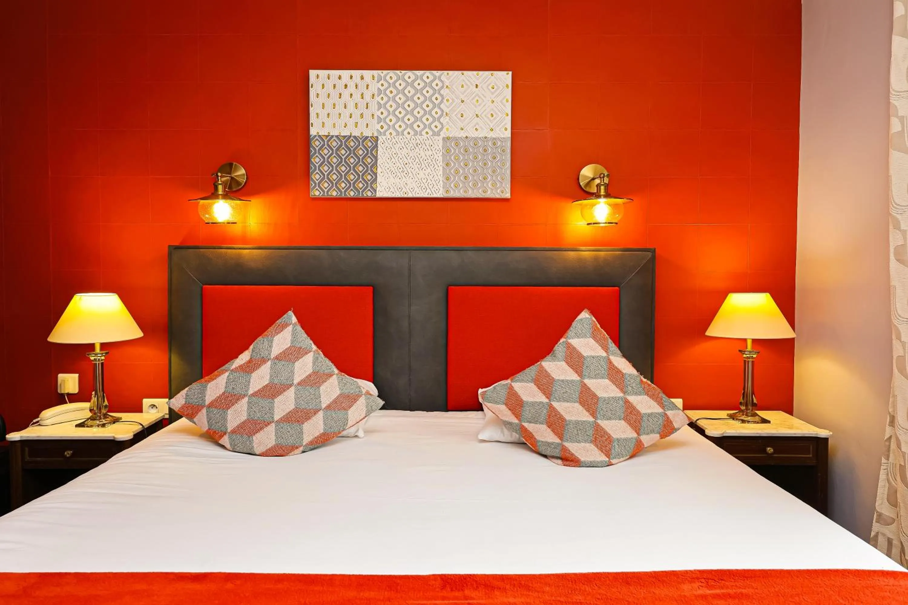 Bed in Hotel Les Pasteliers