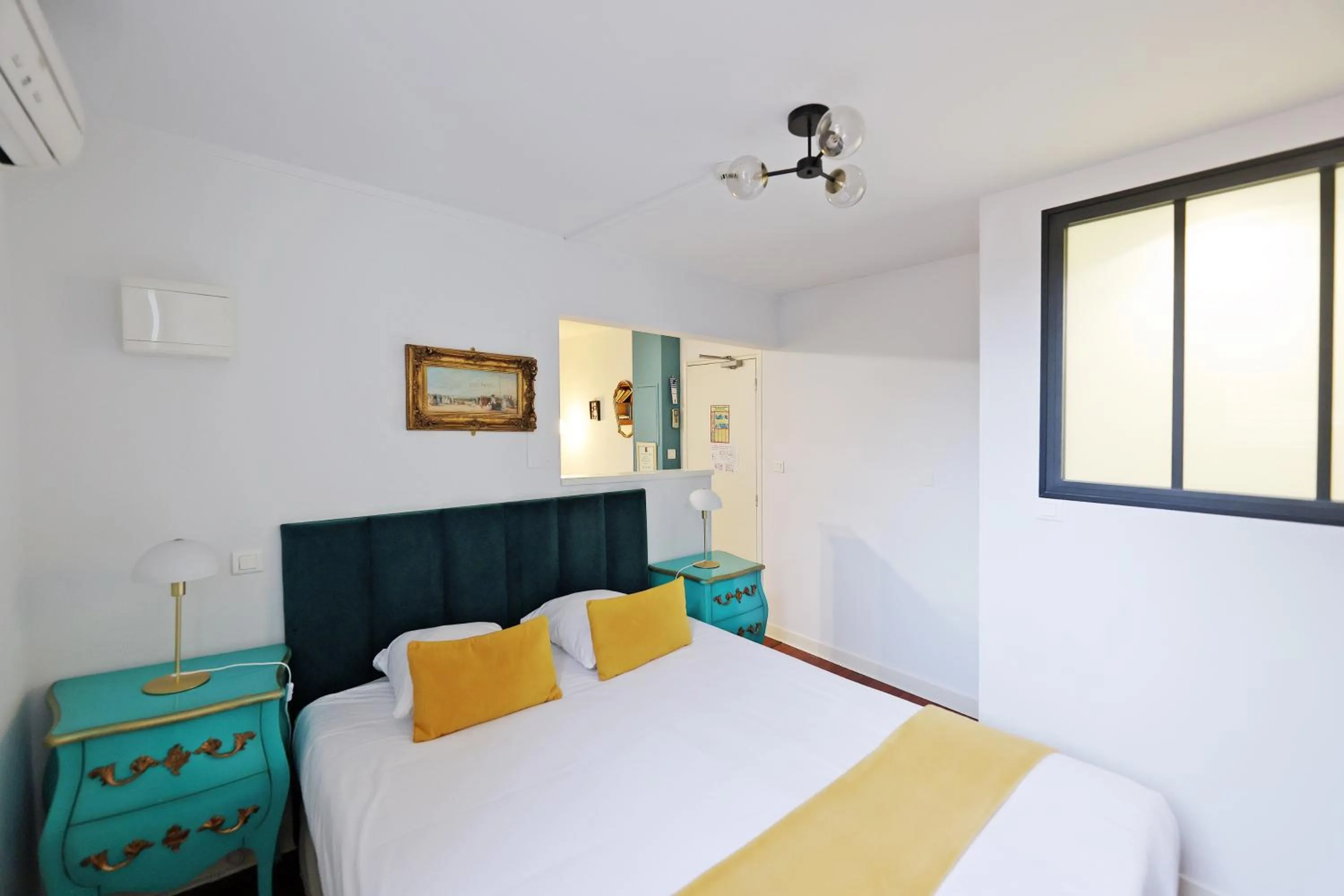 Bed in Hotel Les Pasteliers