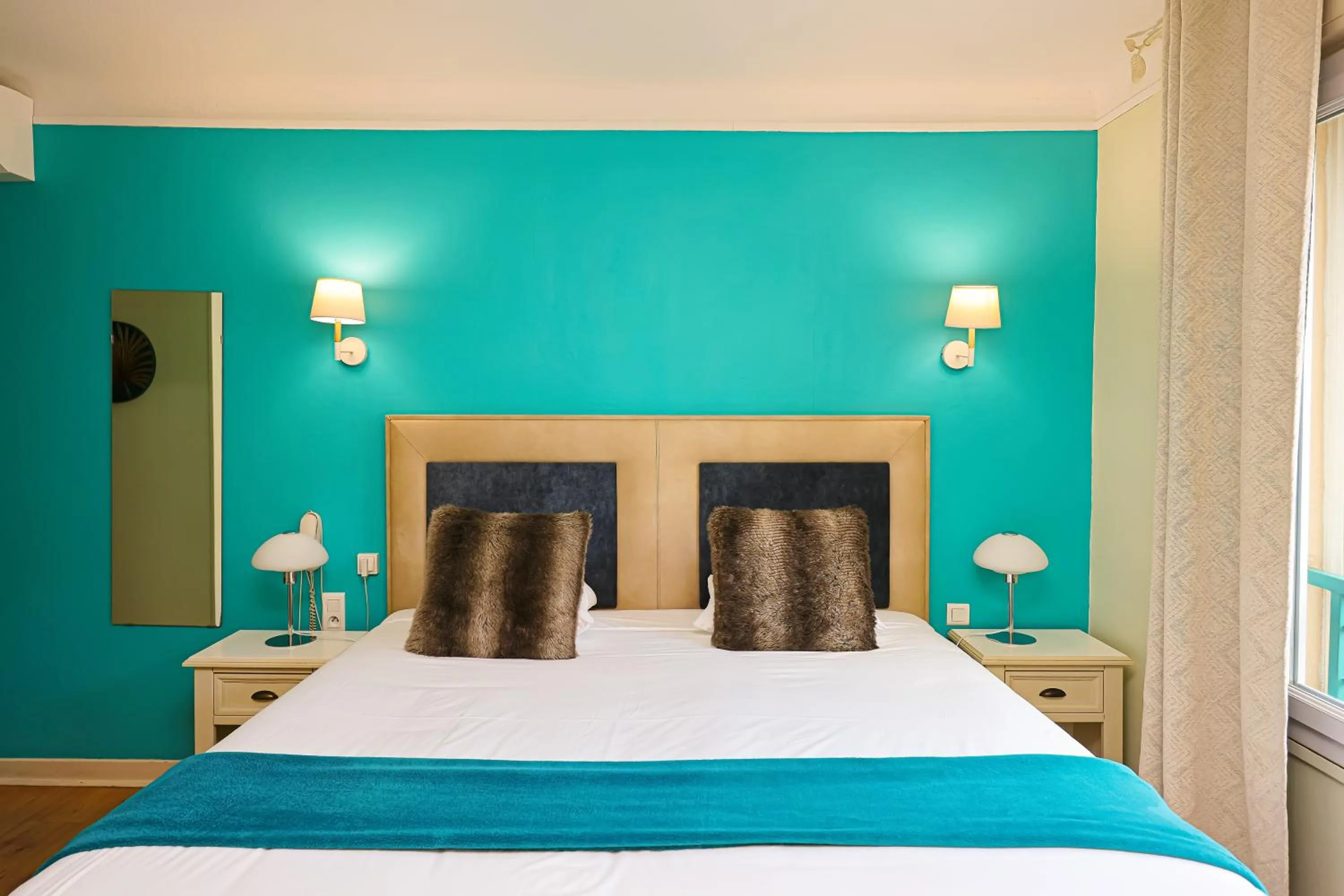 Bed in Hotel Les Pasteliers