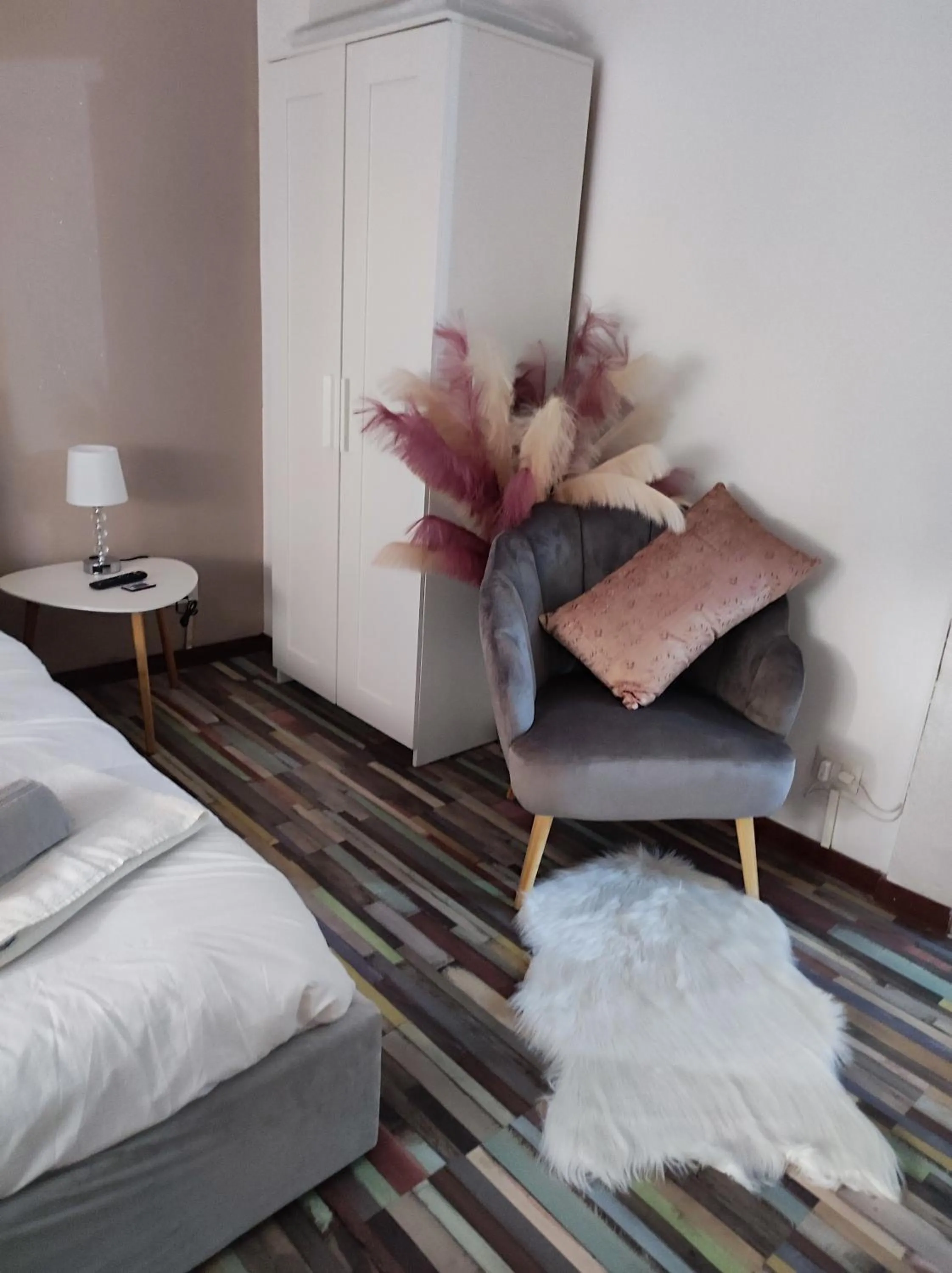 Bedroom in RomAmoR Suite