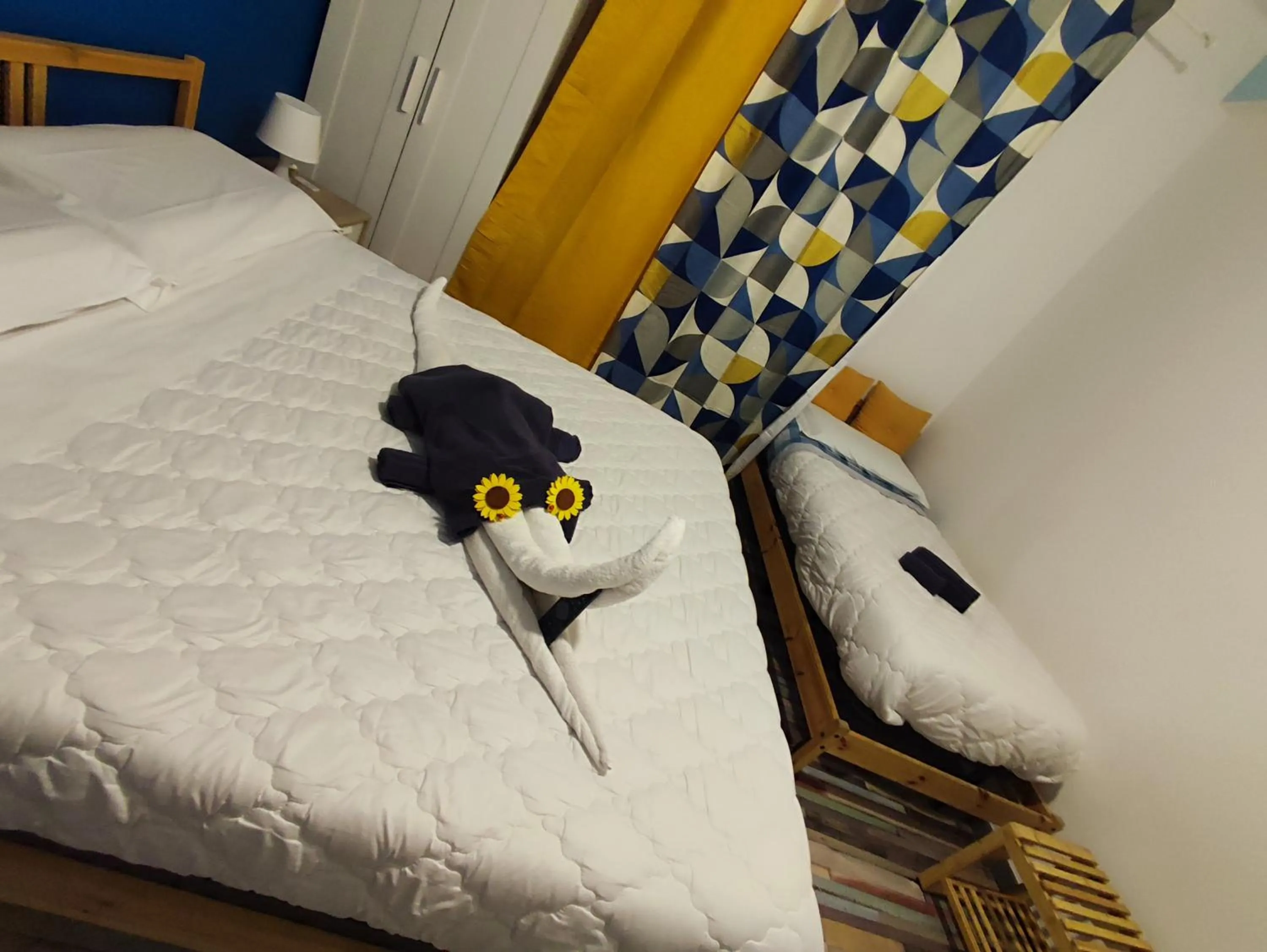 Bedroom in RomAmoR Suite