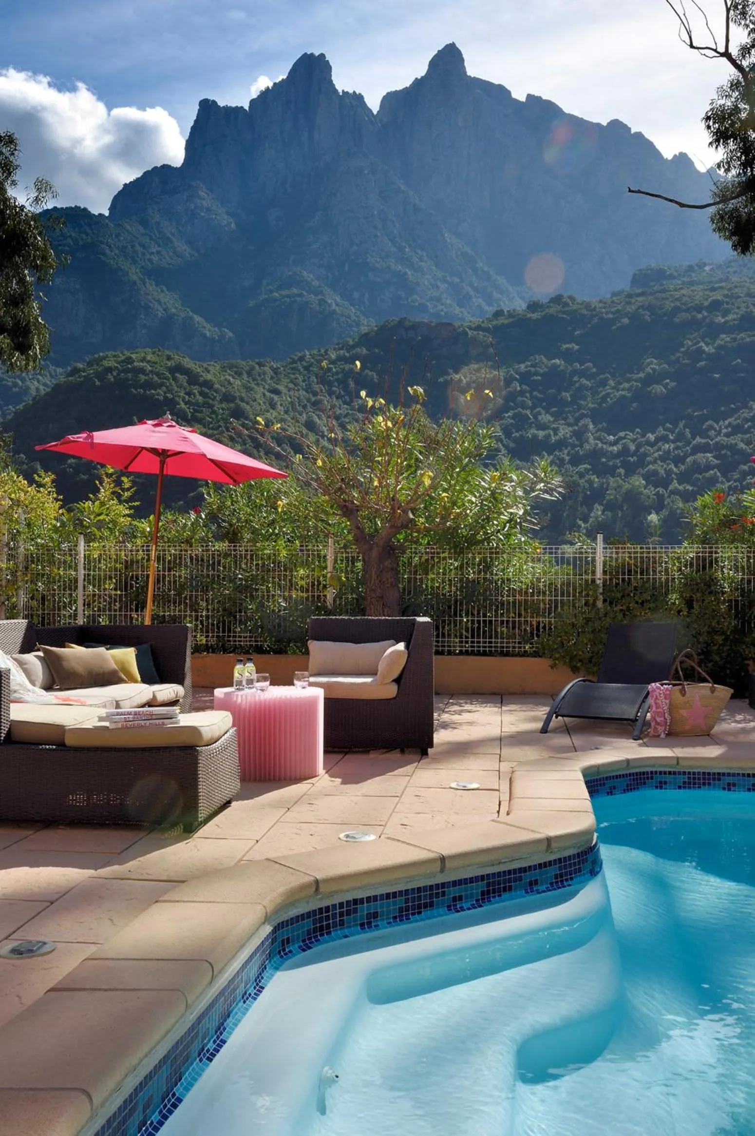 Swimming pool in Logis Hotel Le Lonca