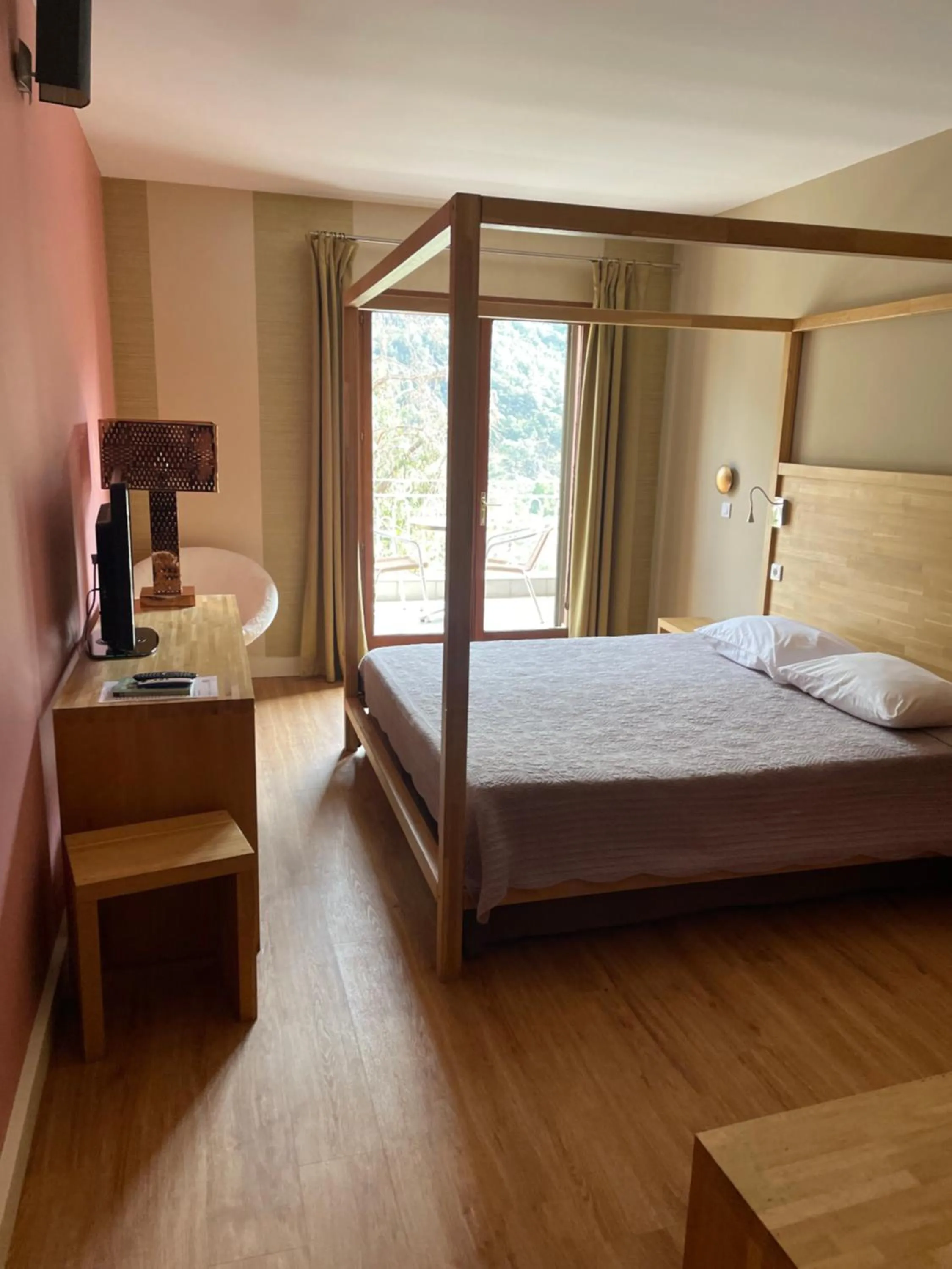 Photo of the whole room, Bed in Logis Hotel Le Lonca