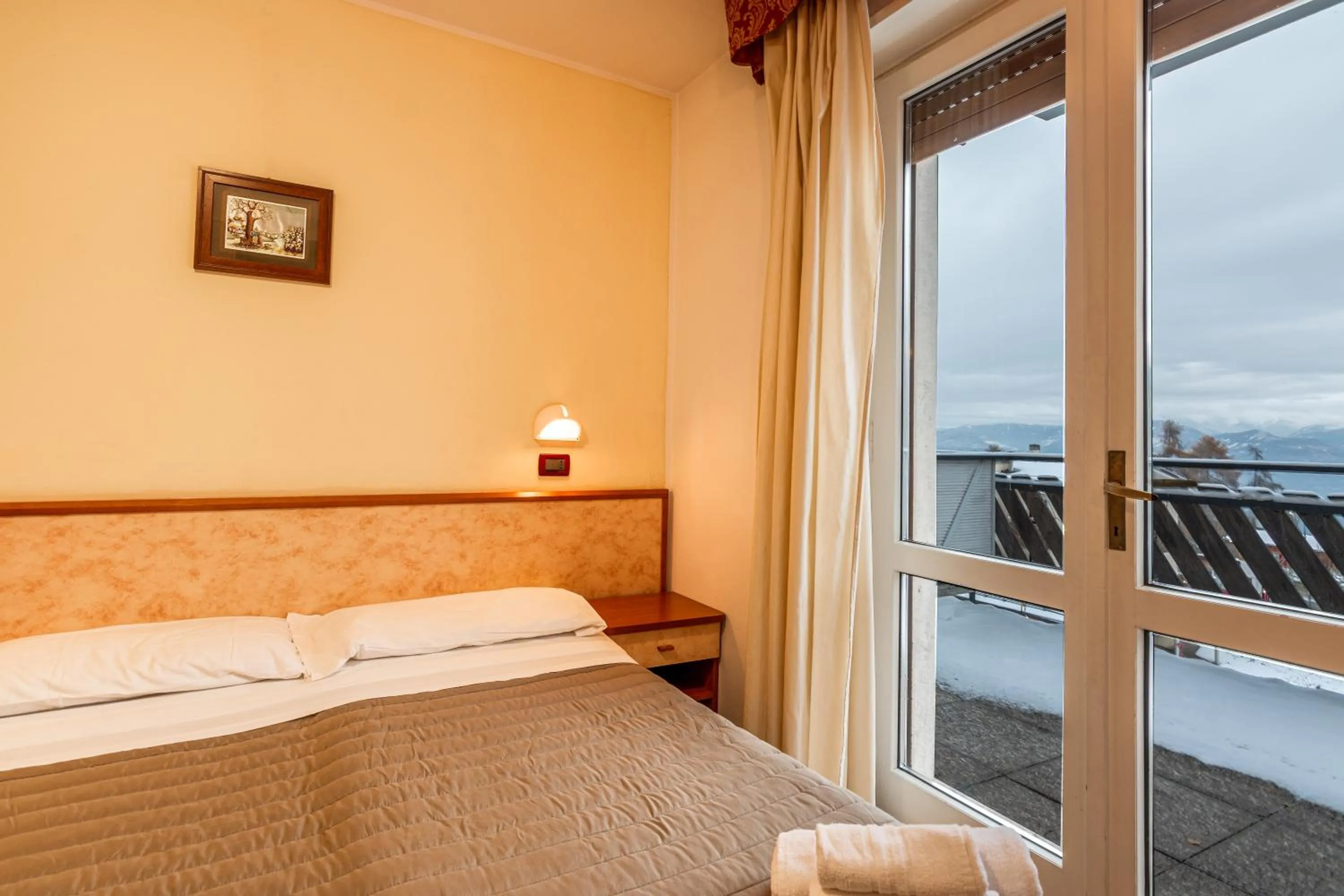 Bed in Hotel Zodiaco & Spa