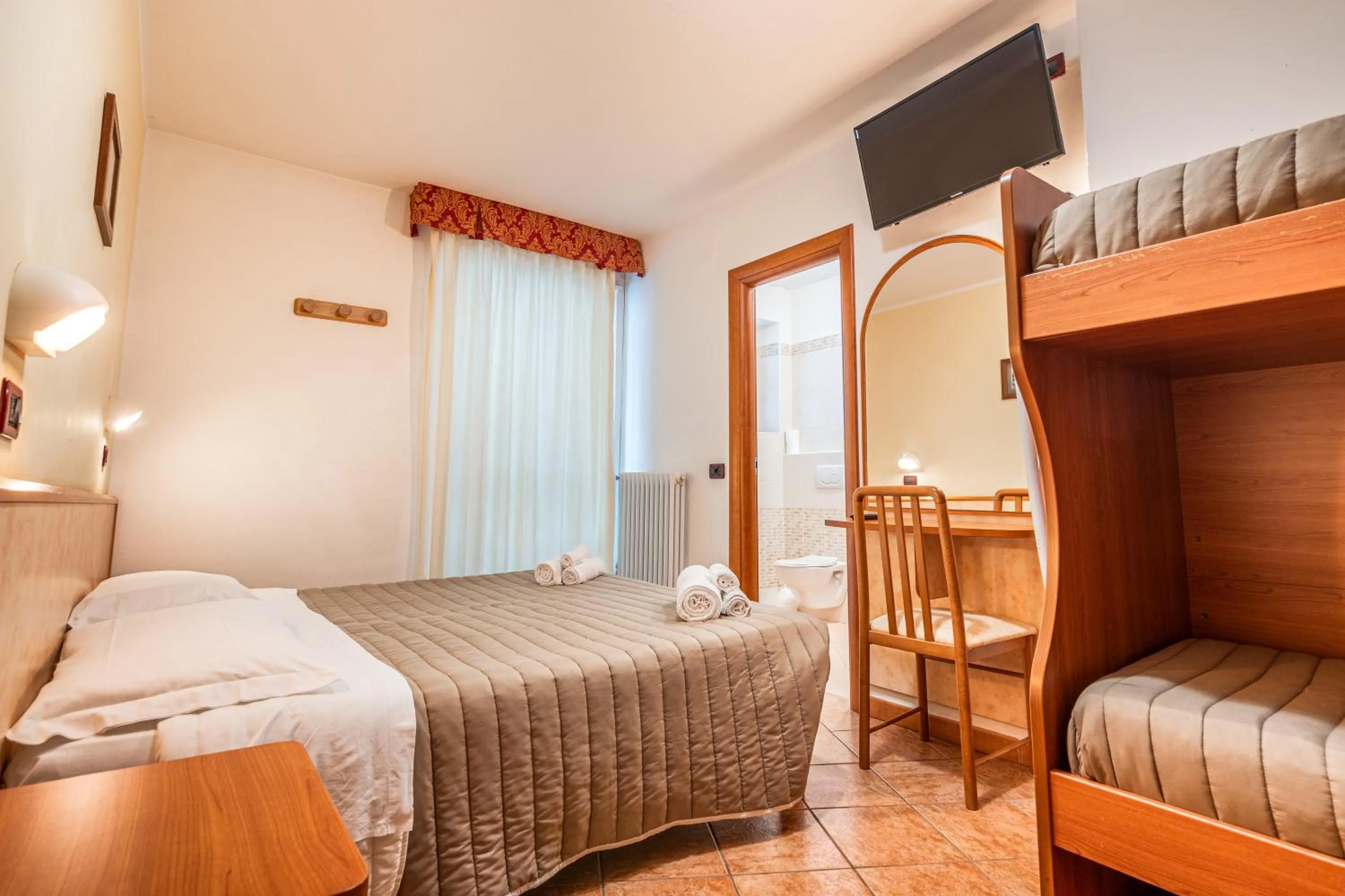 Bed in Hotel Zodiaco & Spa