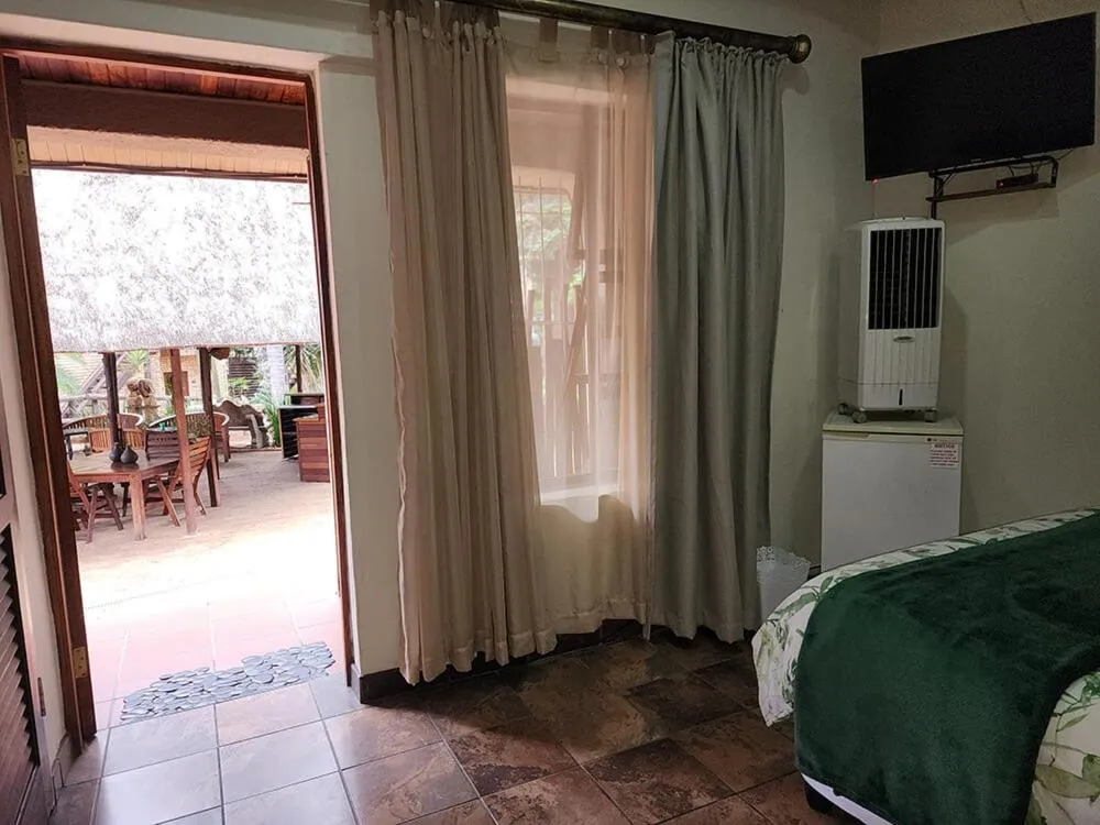 Bed in Goodnight Guest Lodge