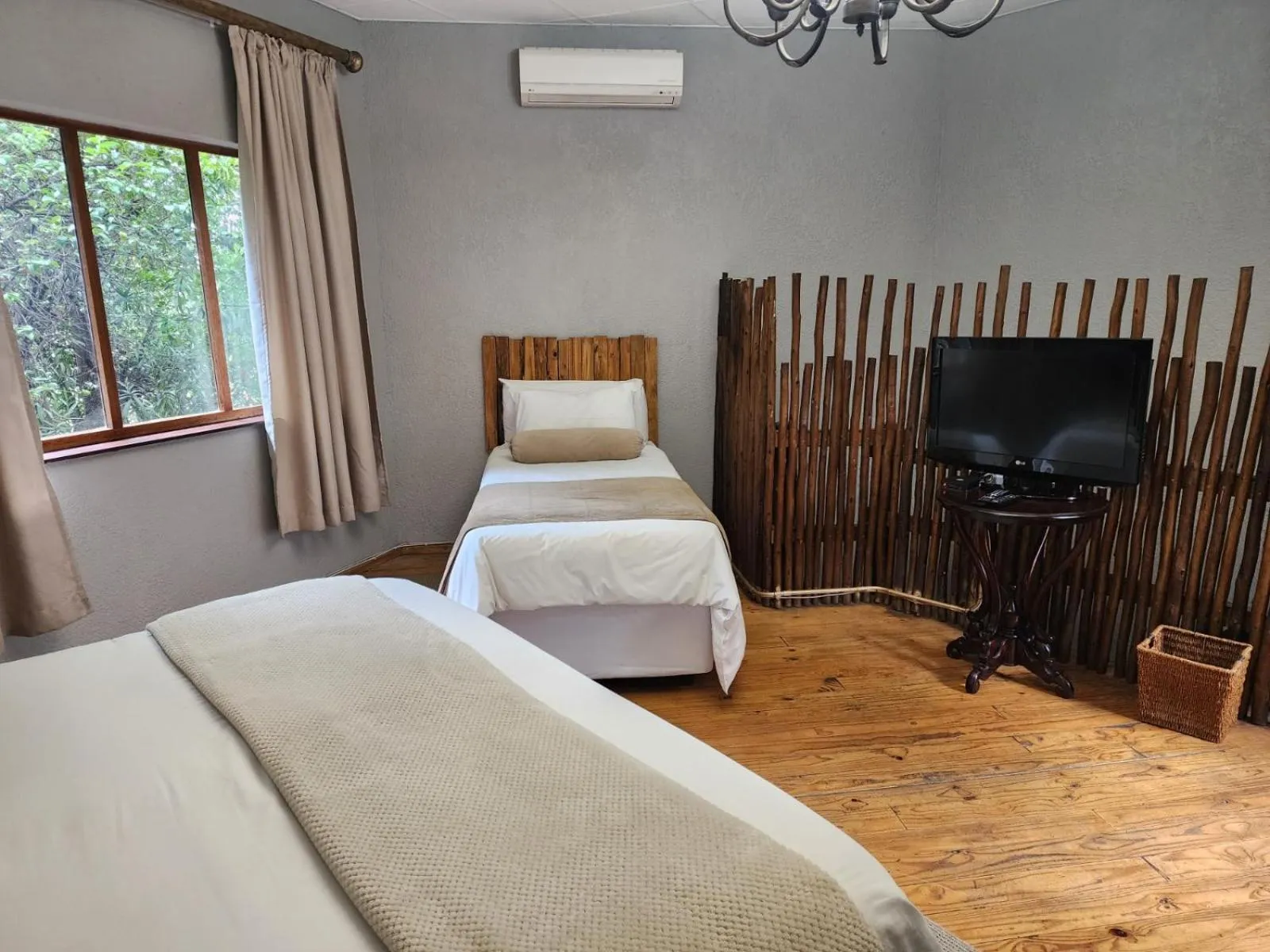 Bed in Goodnight Guest Lodge