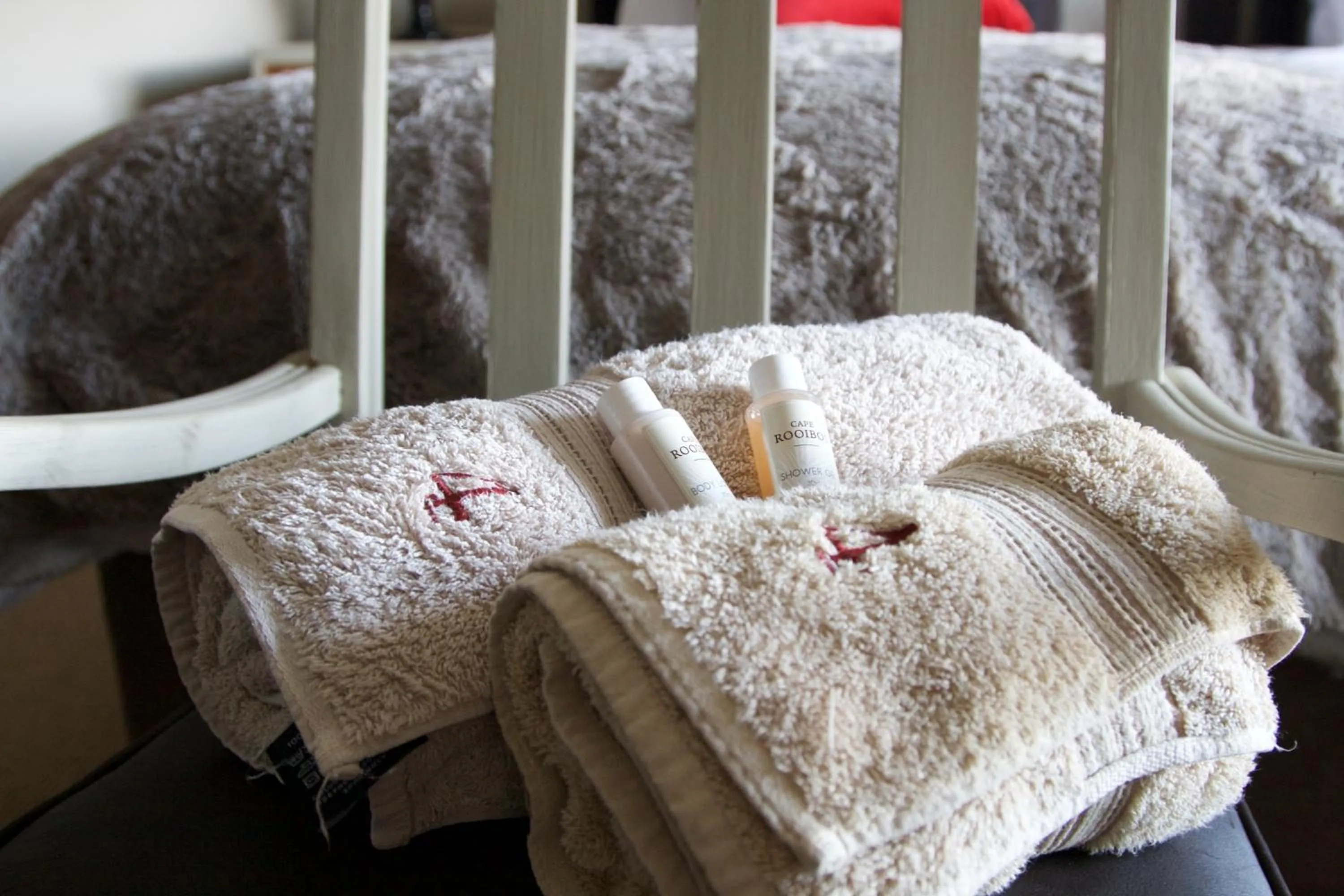 towels, Bed in House Haven Guesthouse
