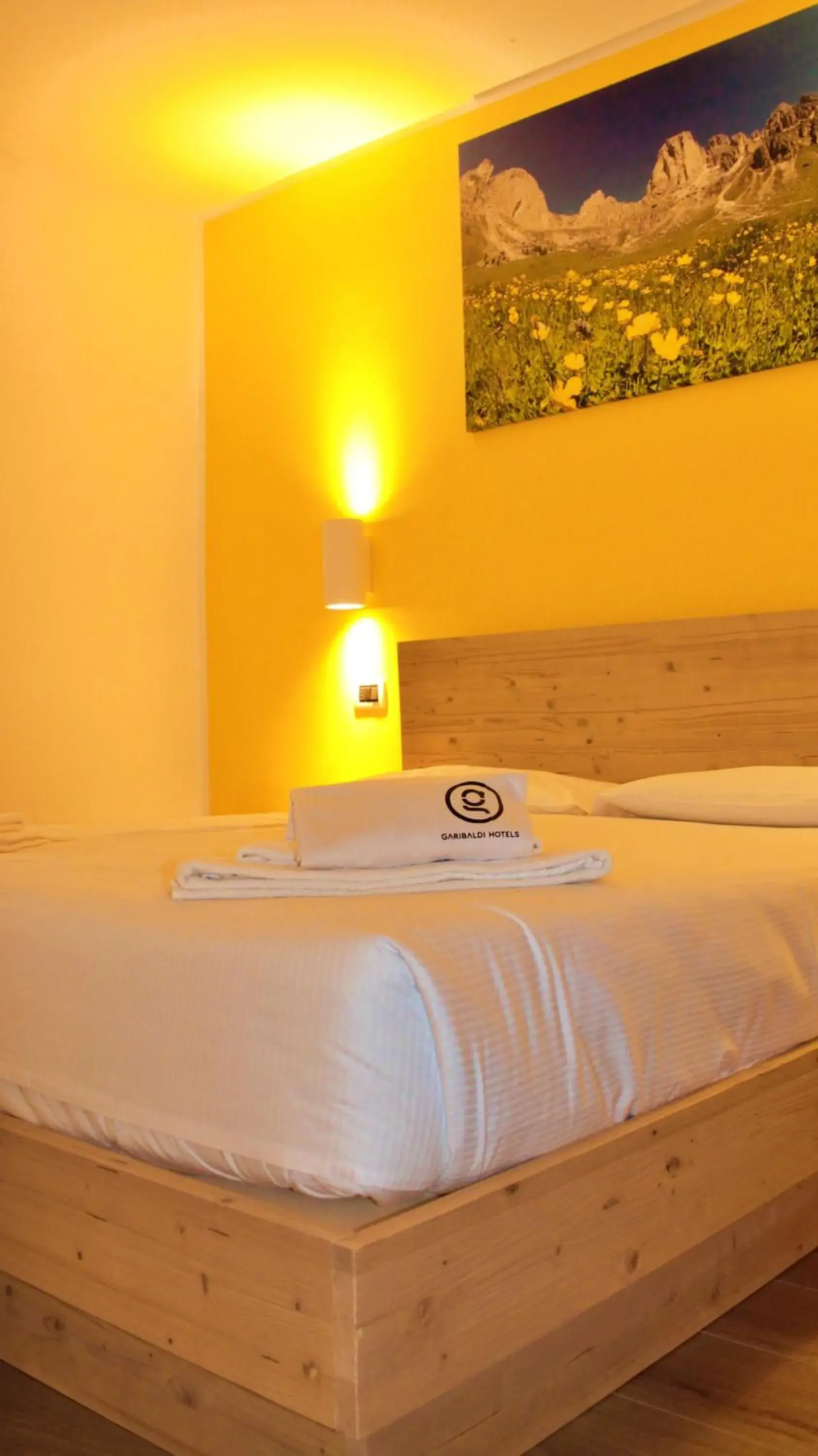 Standard Quadruple Room in GH Hotel Monzoni Standard Quadruple Room in GH Hotel Monzoni