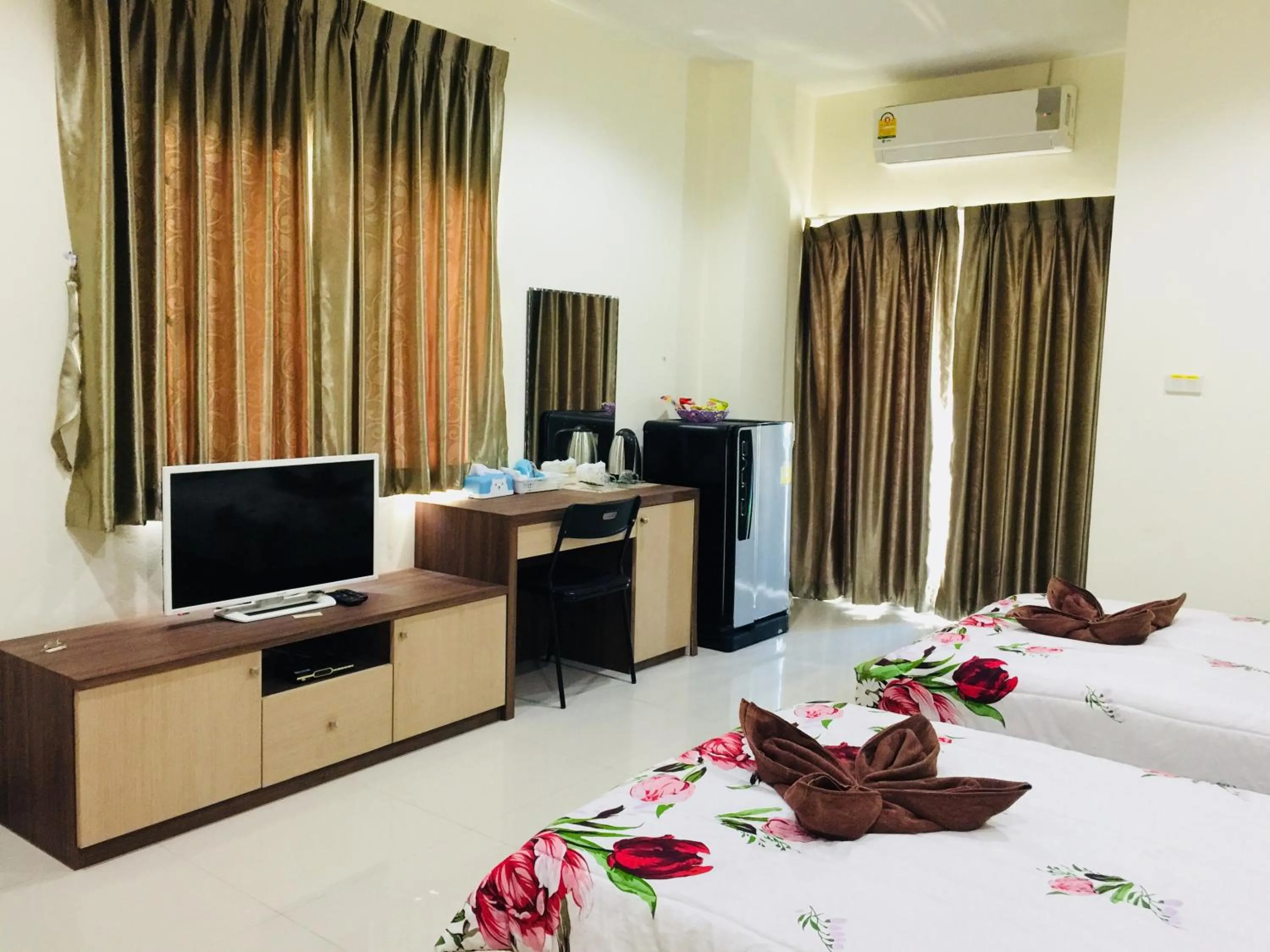 Bed in Thani Residence