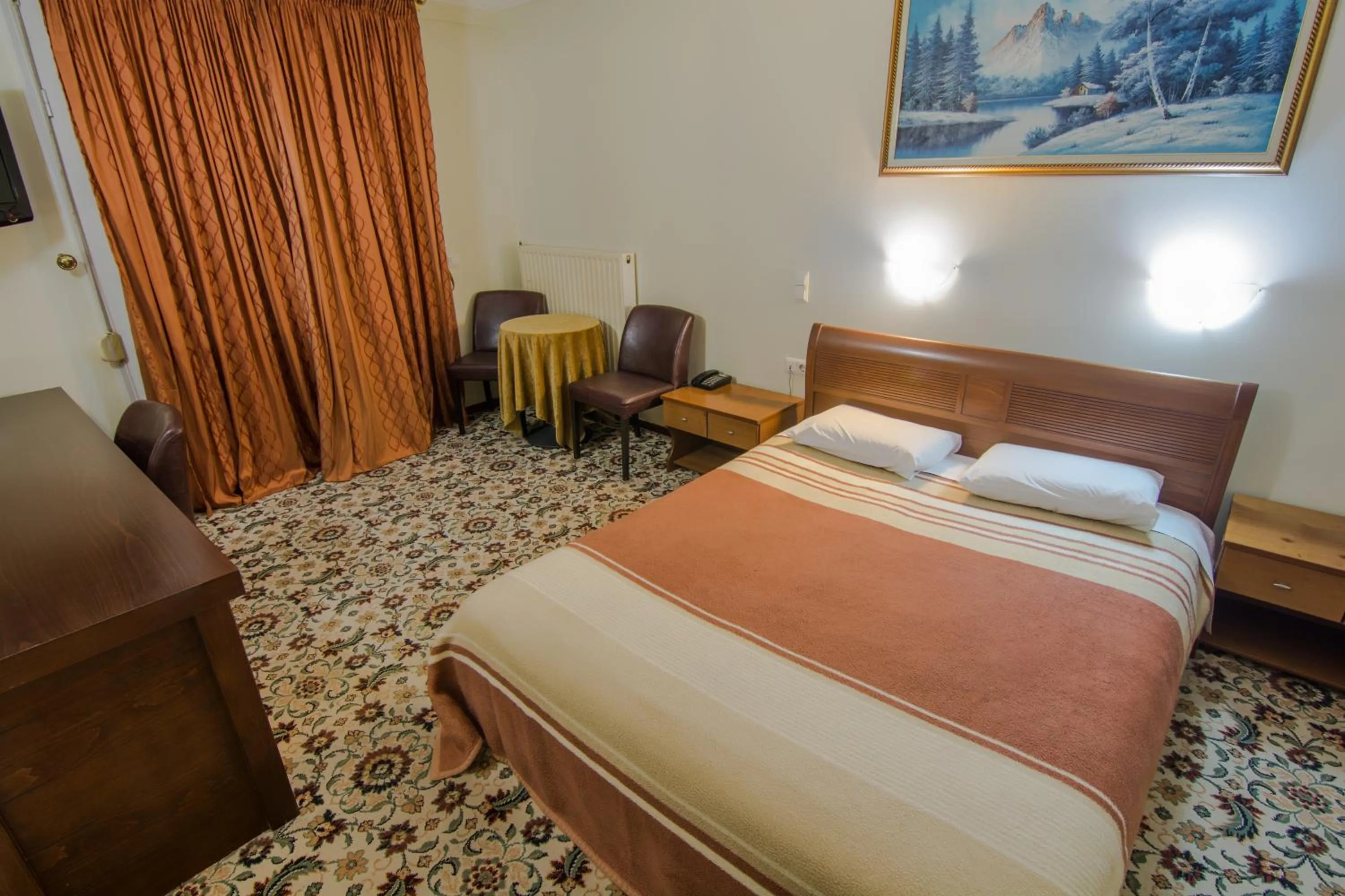 Bed in Hotel Alexandros