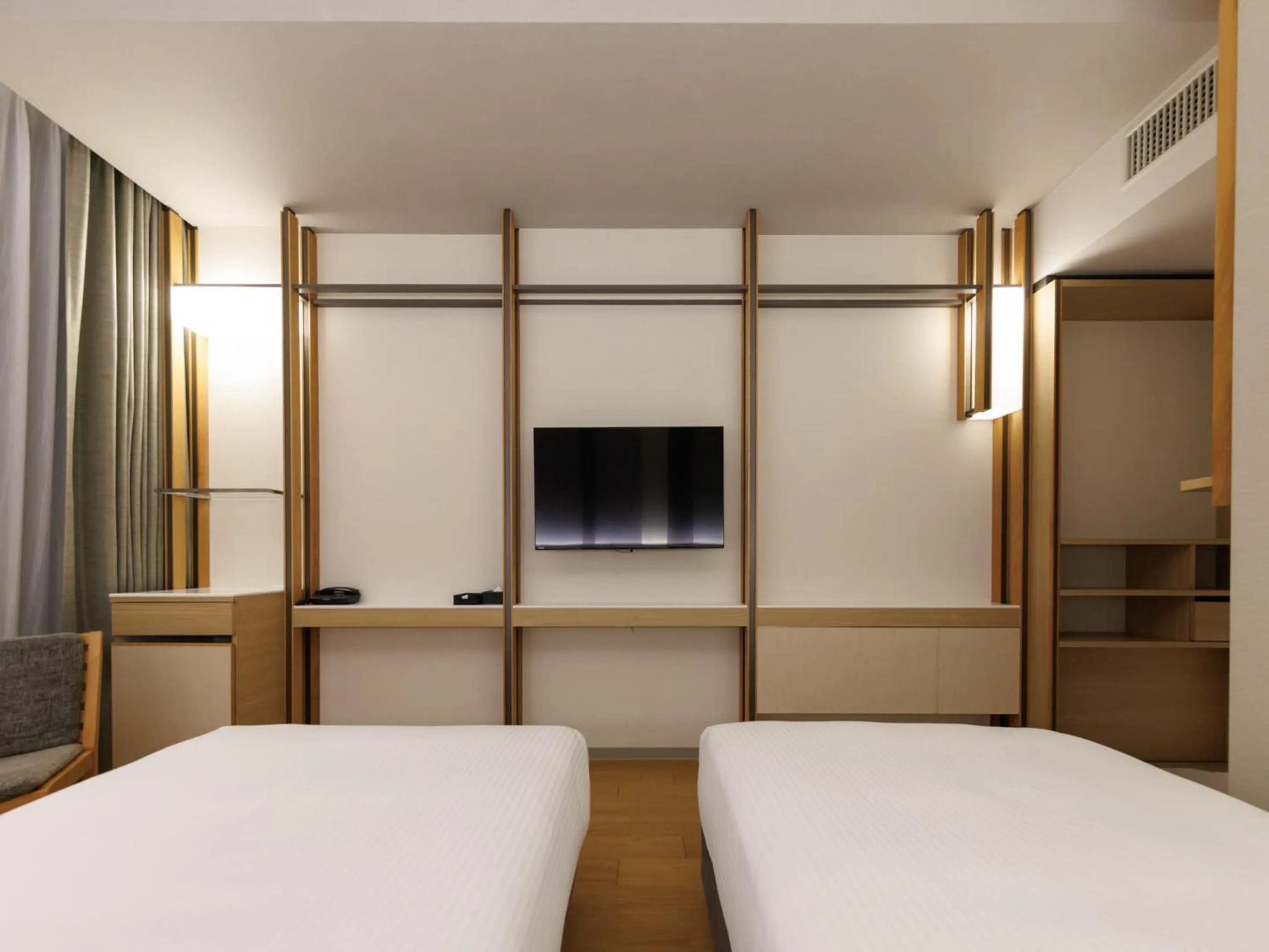 Photo of the whole room, Bed in JR Kyushu Hotel Blossom Naha