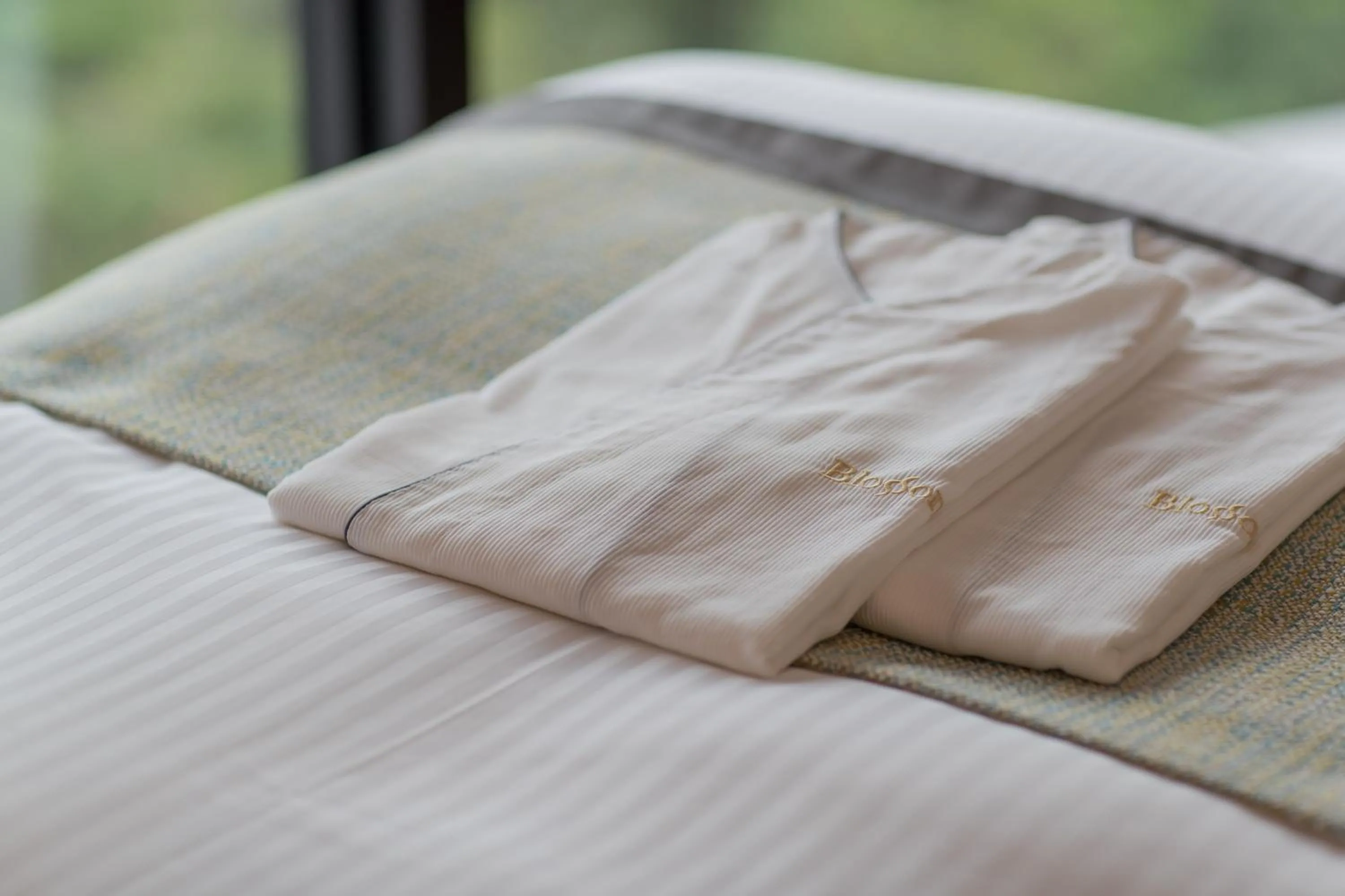 Bed in JR Kyushu Hotel Blossom Naha