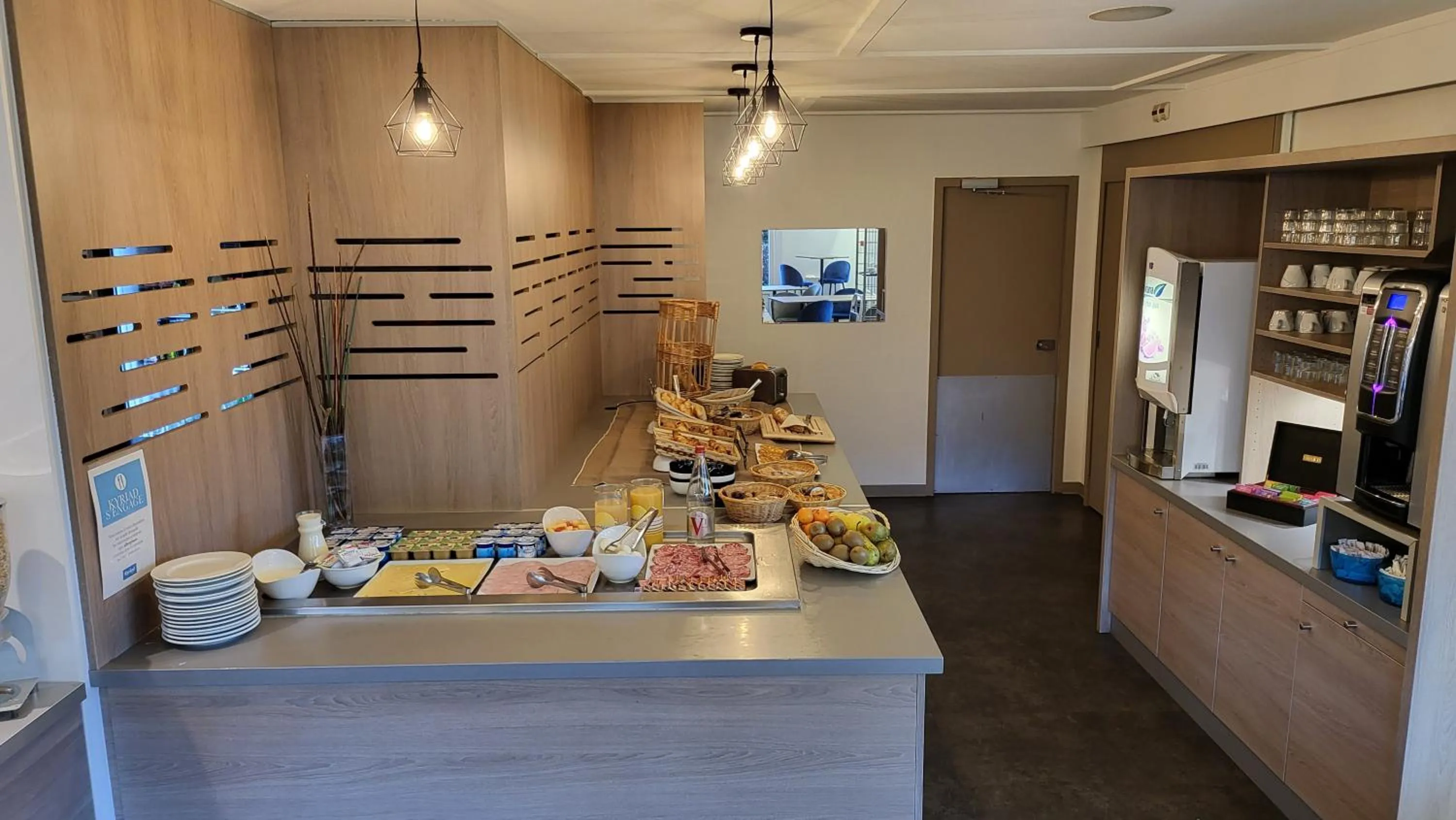 Buffet breakfast in Kyriad Bellegarde - Genève