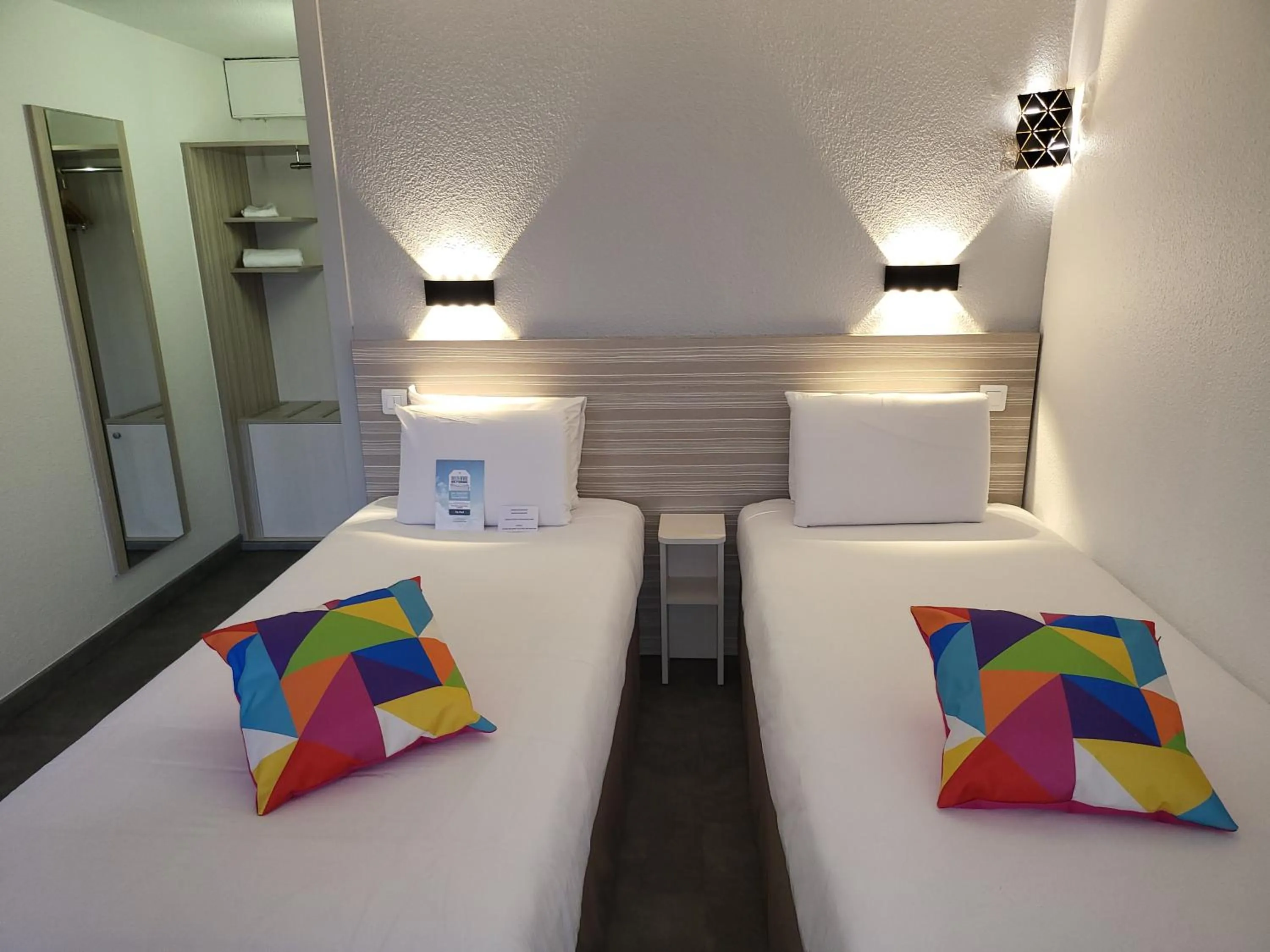 Bed in Kyriad Bellegarde - Genève