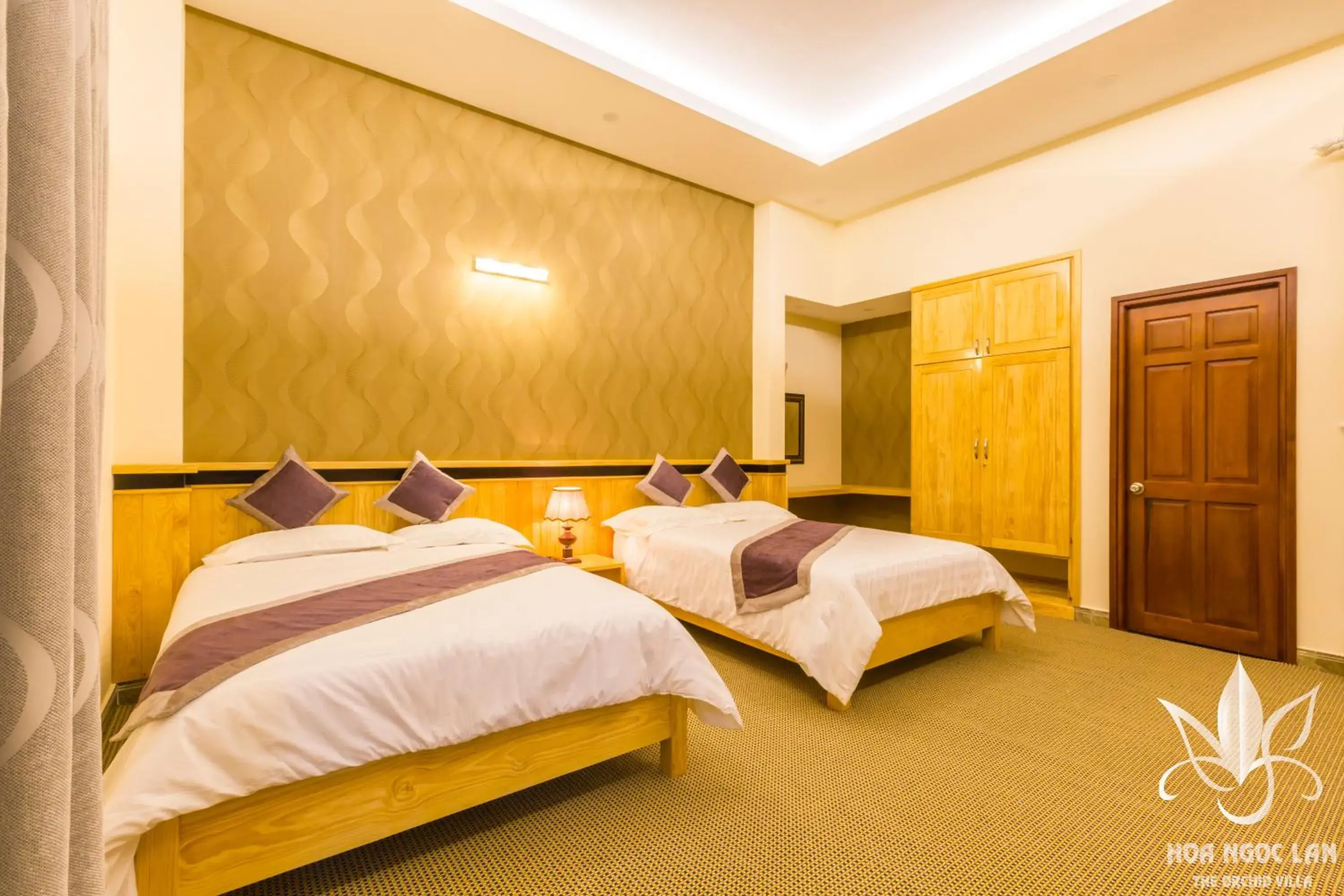 Quadruple Room in Hoa Ngoc Lan - The Orchid Villa Dalat Quadruple Room in Hoa Ngoc Lan - The Orchid Villa Dalat