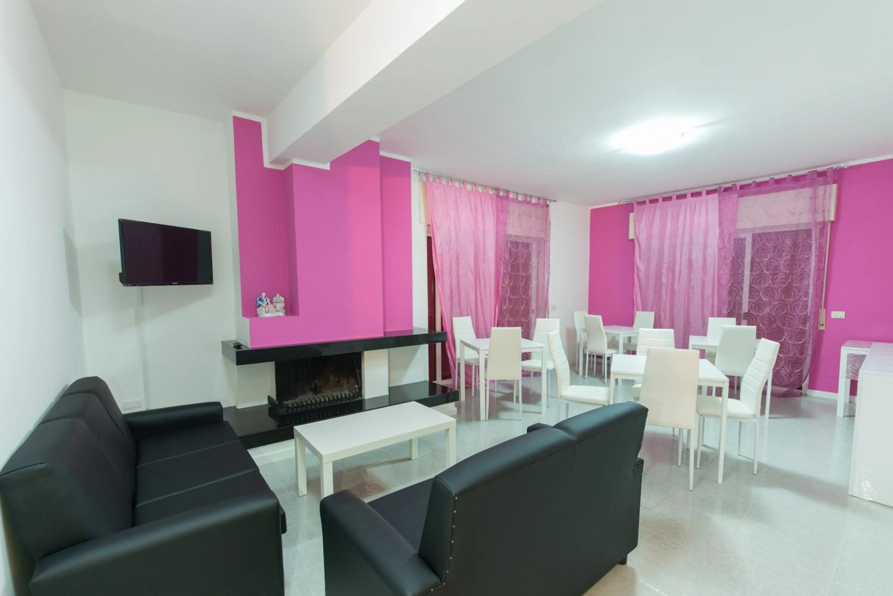 Communal lounge/ TV room in Villa Milena