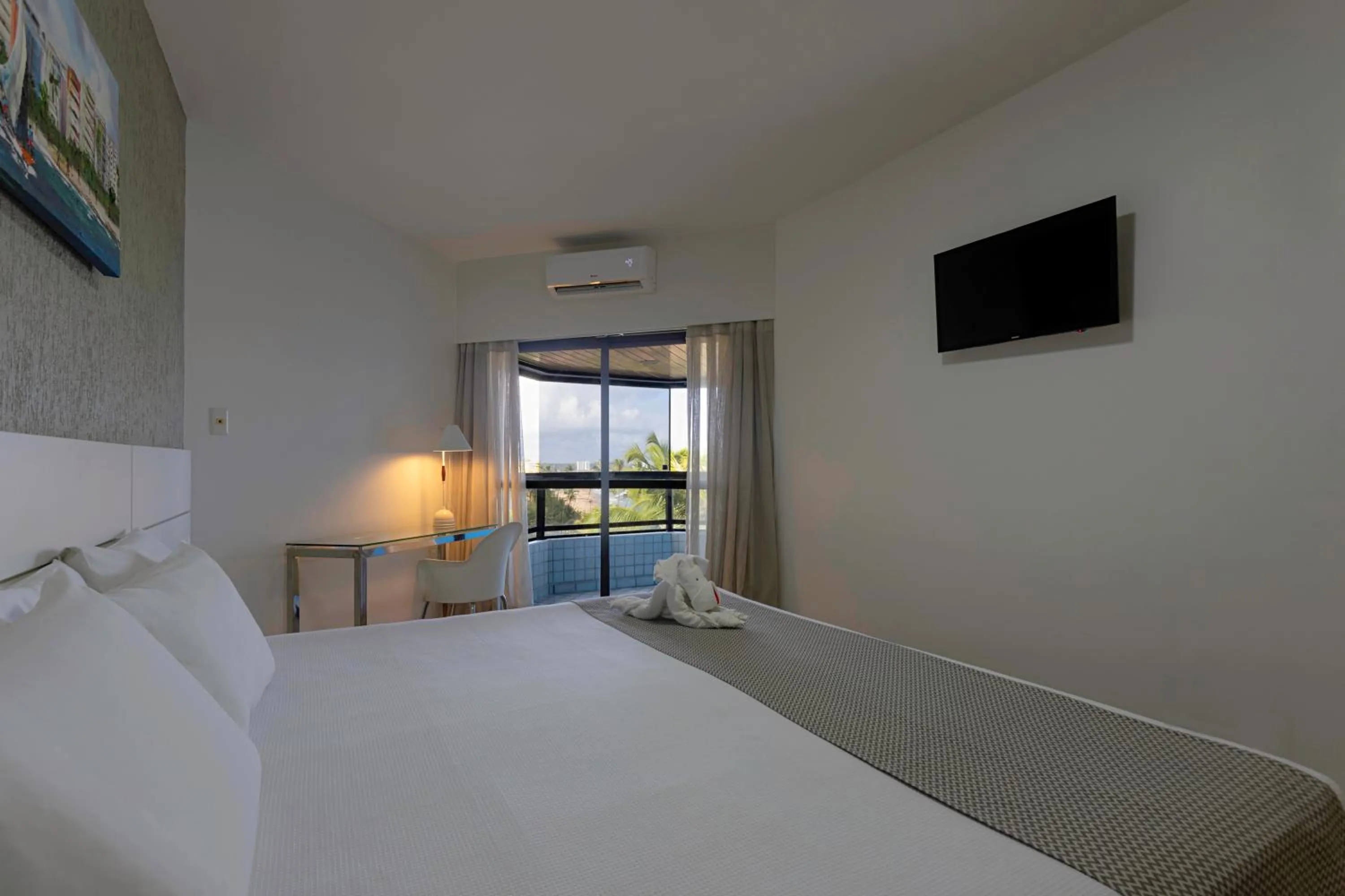 Bed in Maceió Atlantic Suites