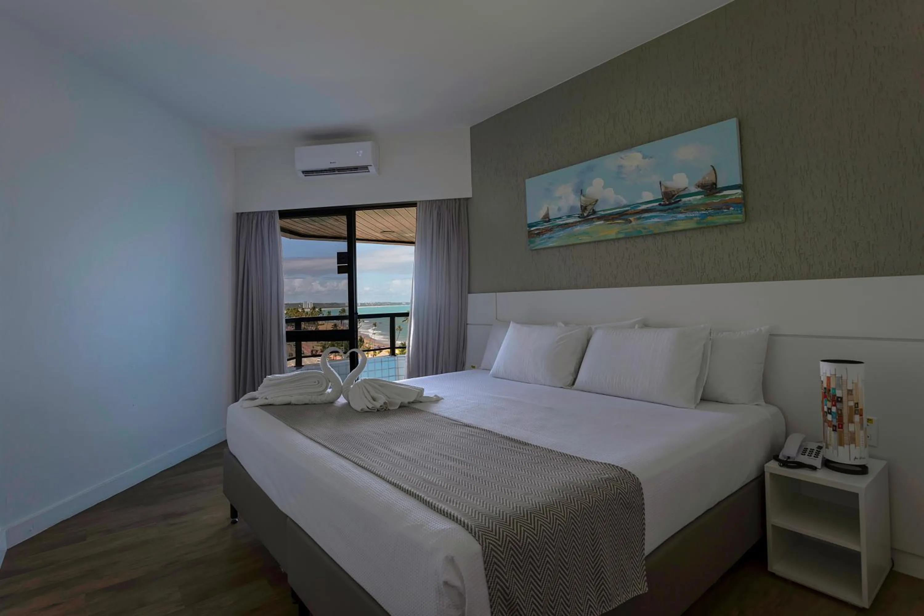 Bed in Maceió Atlantic Suites