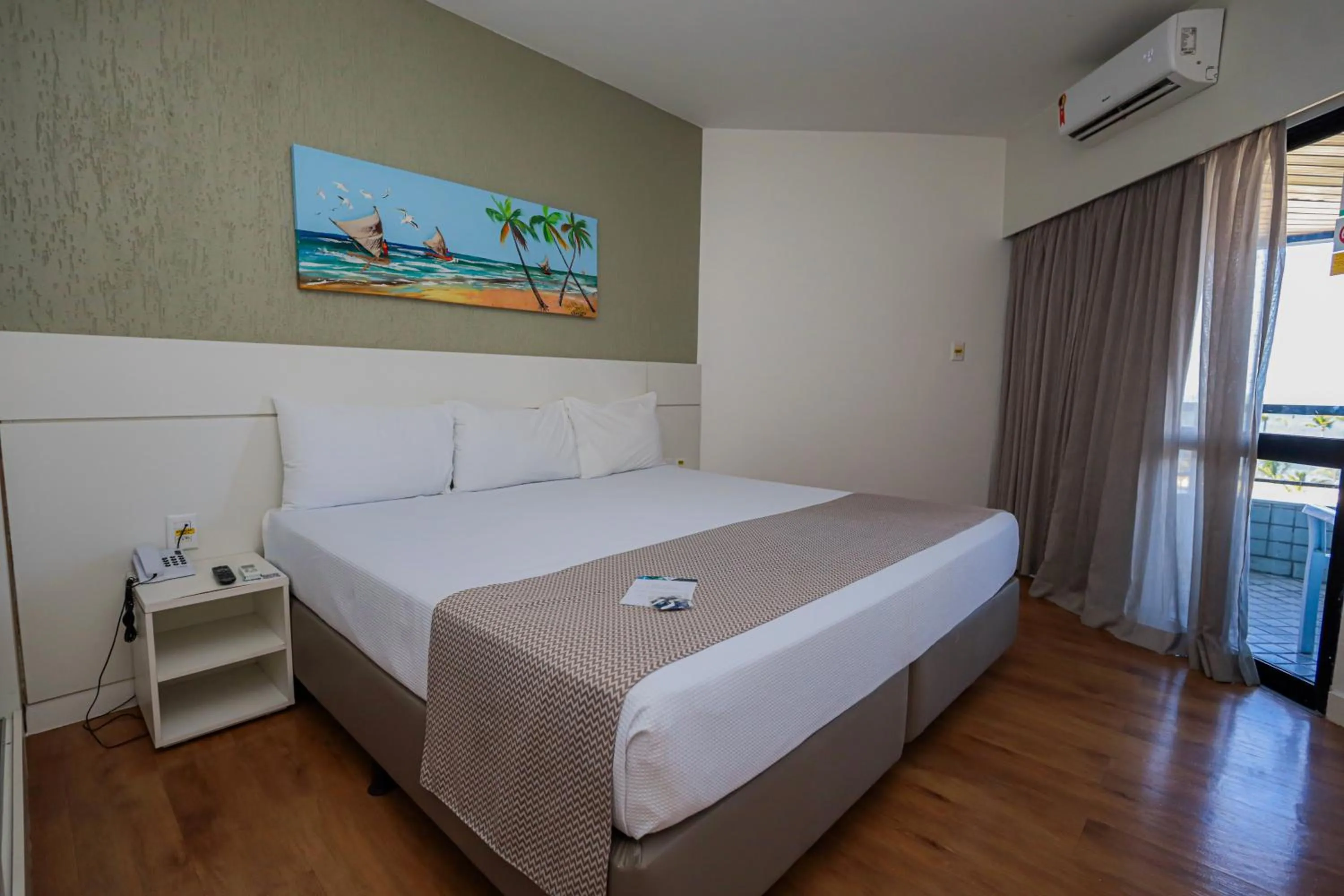 Bed in Maceió Atlantic Suites
