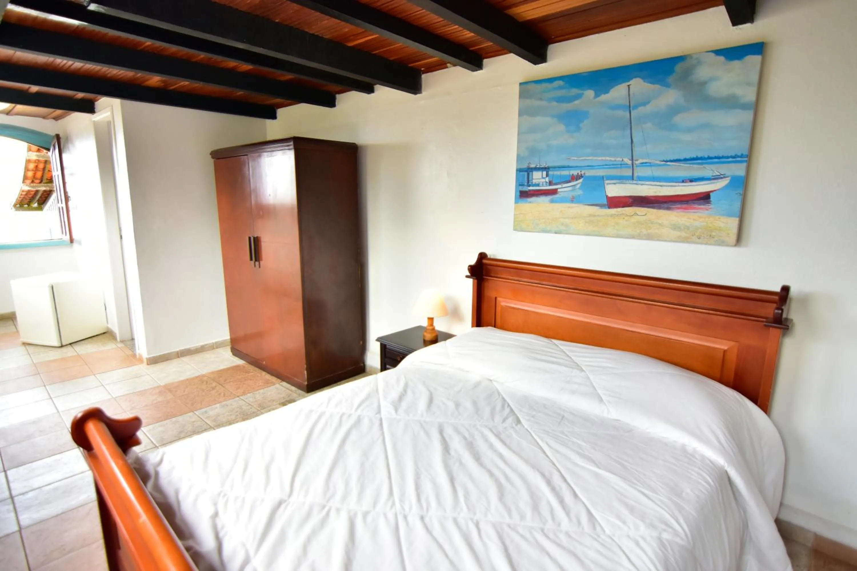 Bed in Pousada Tanto Mar