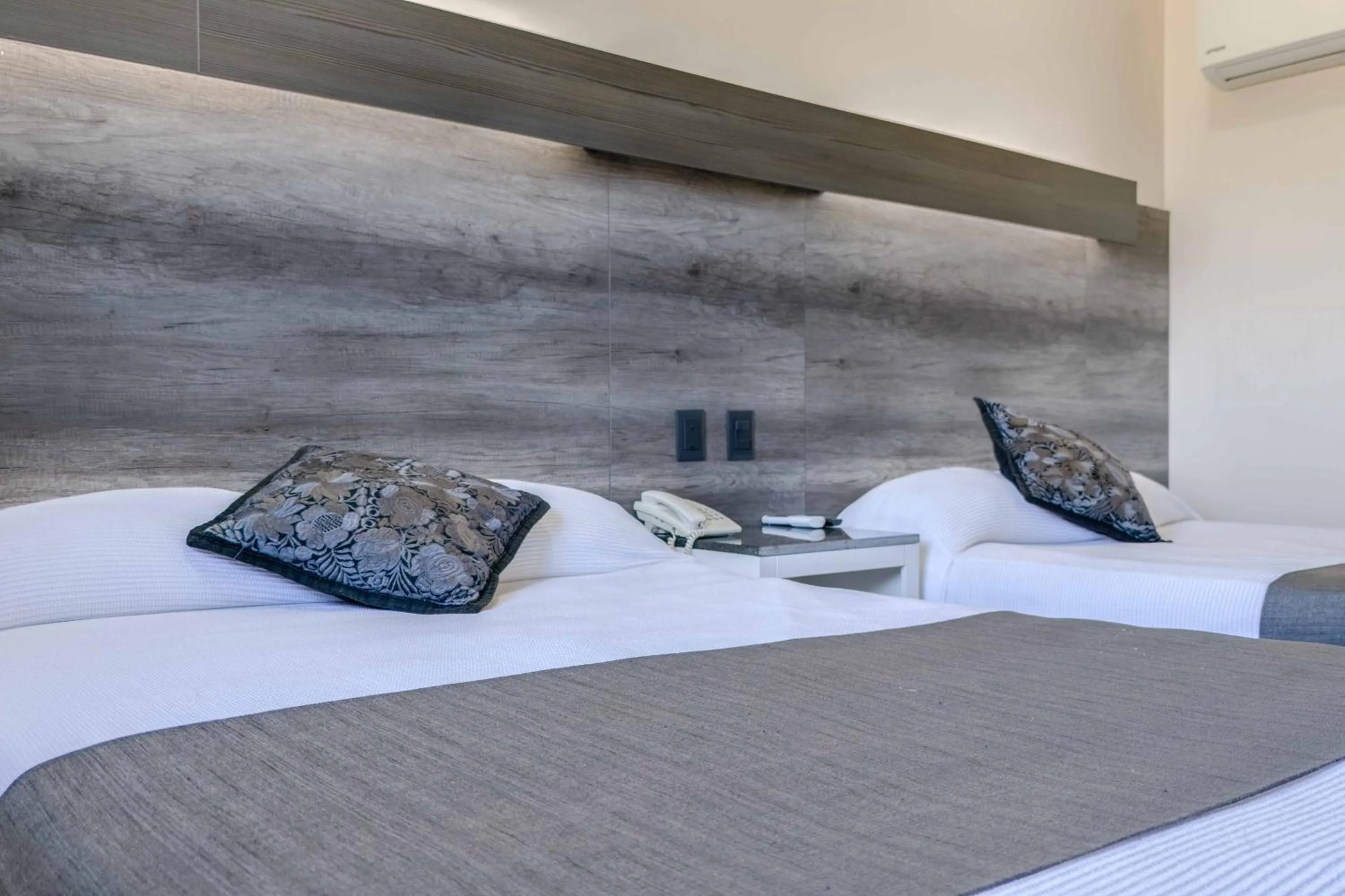 Bed in Homesuites Malecon