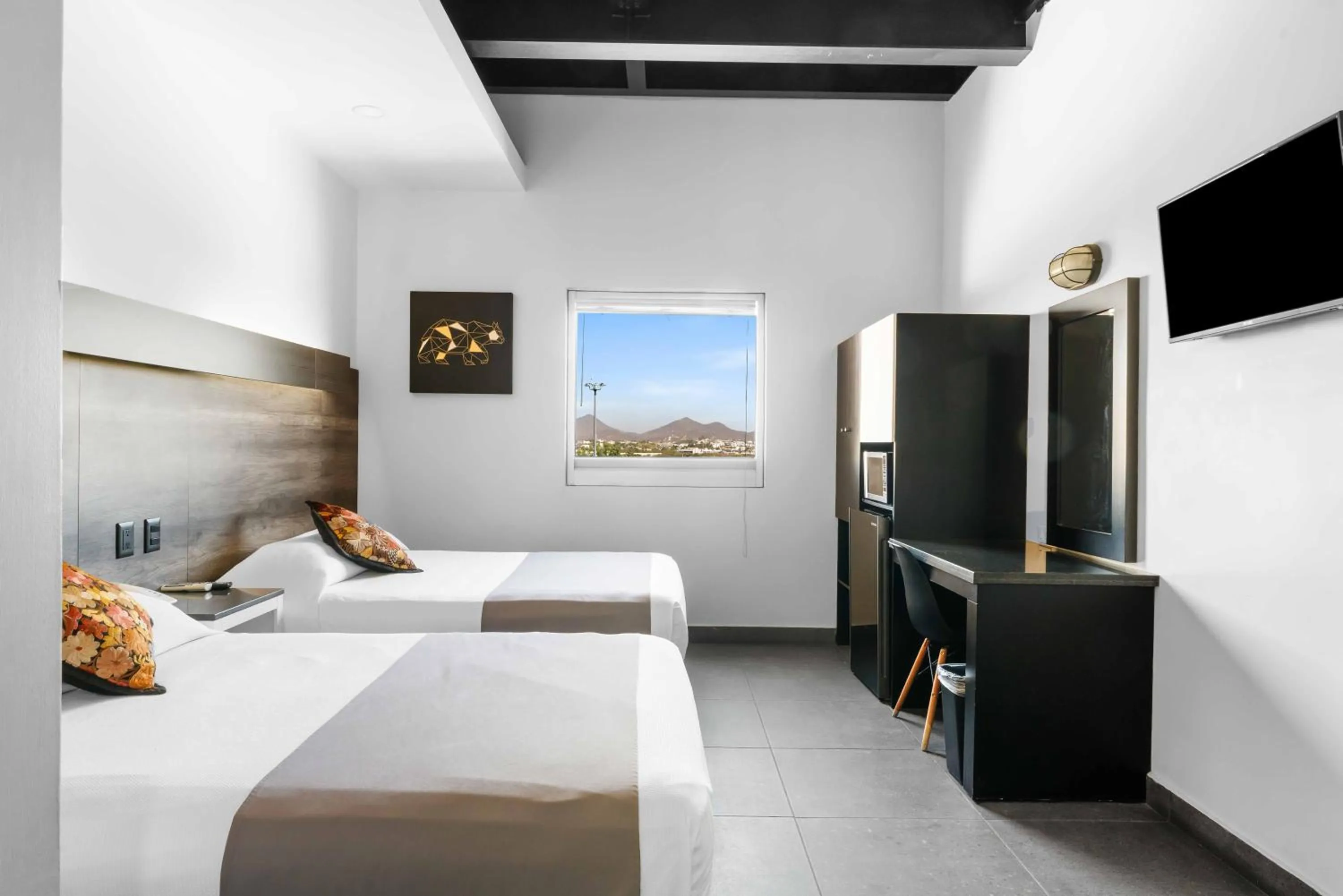 Bed in Homesuites Malecon