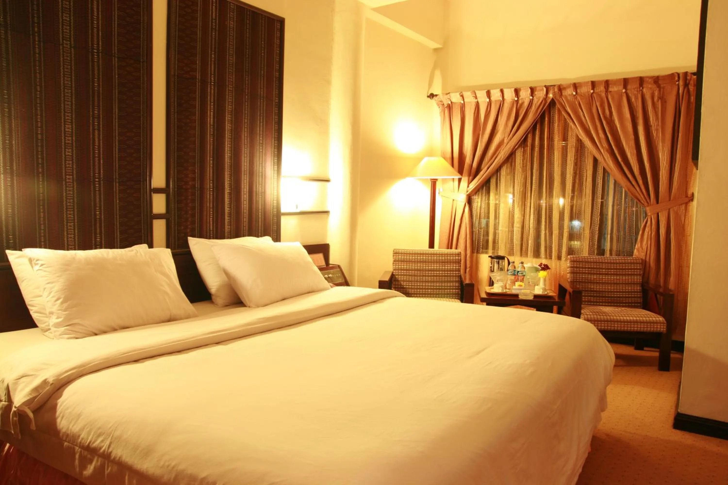 Photo of the whole room, Bed in Hotel Sibayak Internasional