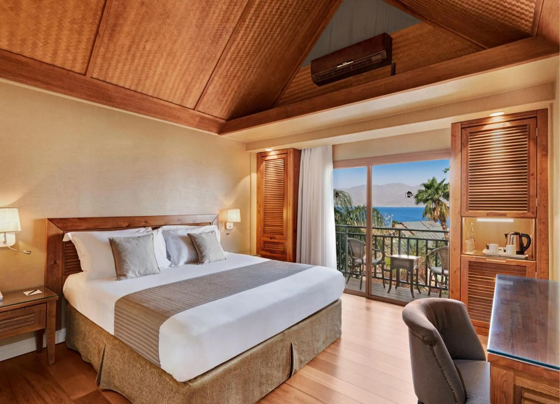 Living room, Bed in Orchid Eilat Hotel