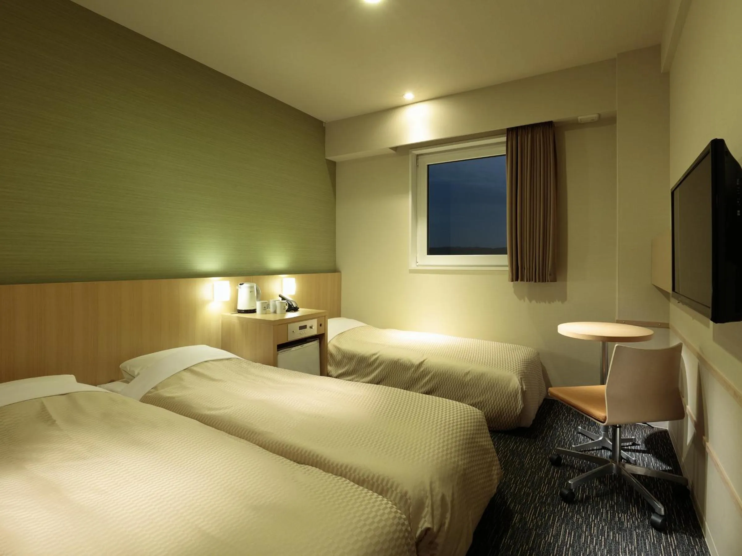 Bed in Candeo Hotels Shizuoka Shimada