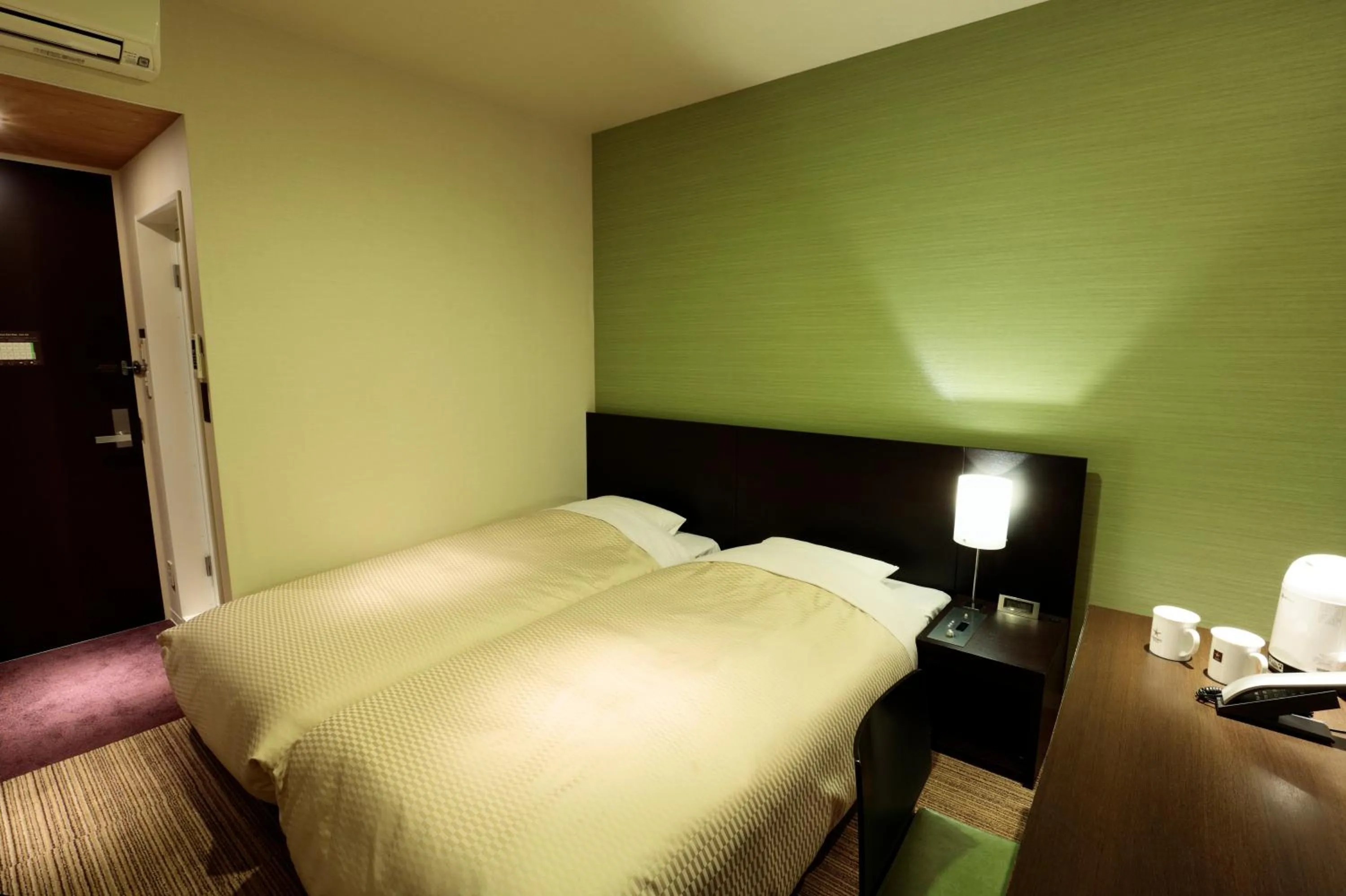 Bed in Candeo Hotels Shizuoka Shimada