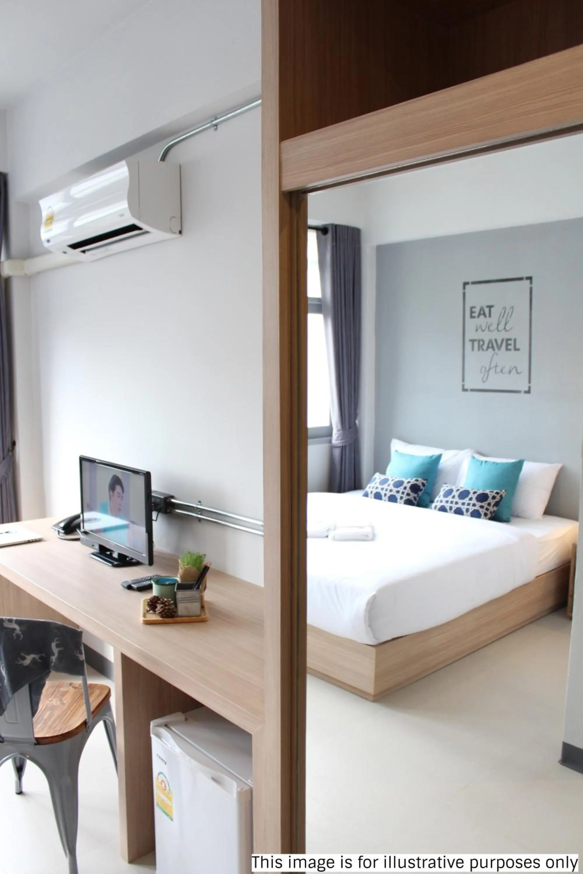 Photo of the whole room, Bed in Rajthani Hotel Surat Thani - SHA Certified