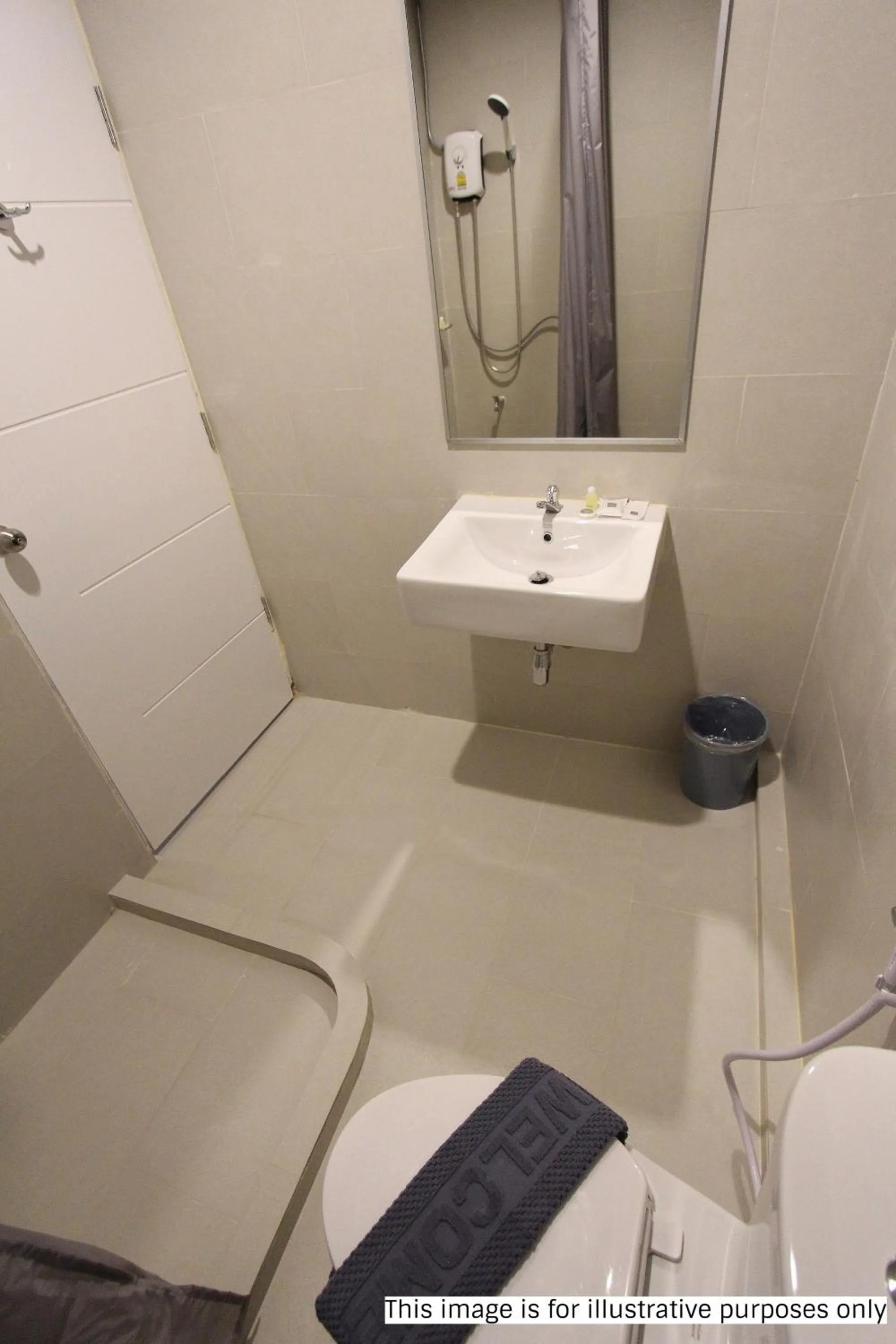 Bathroom in Rajthani Hotel Surat Thani - SHA Certified
