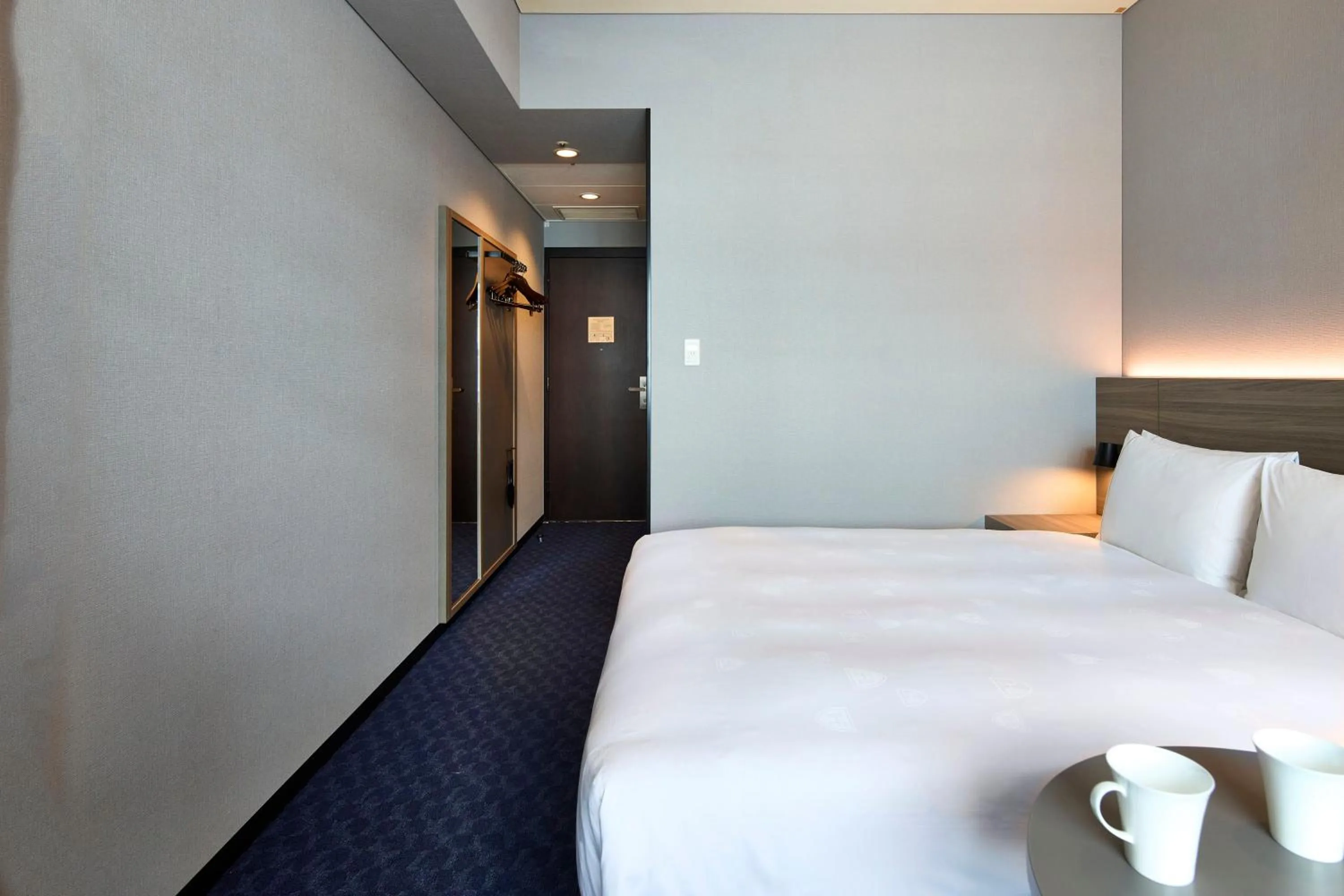 Photo of the whole room, Bed in The Royal Park Hotel Iconic Tokyo Shiodome