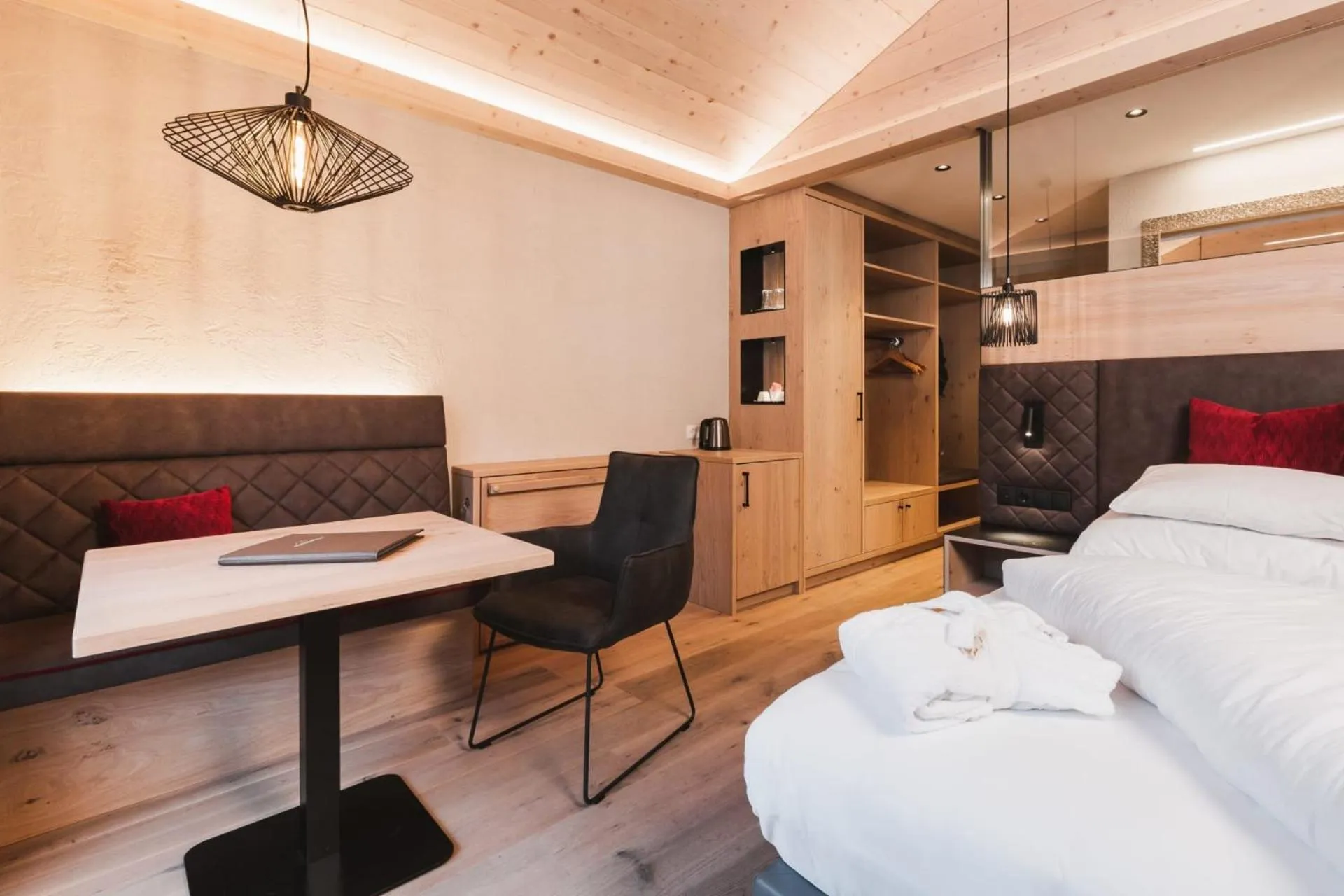 Seating area, Bed in Hotel Riederhof- Urlaub mit WAU!