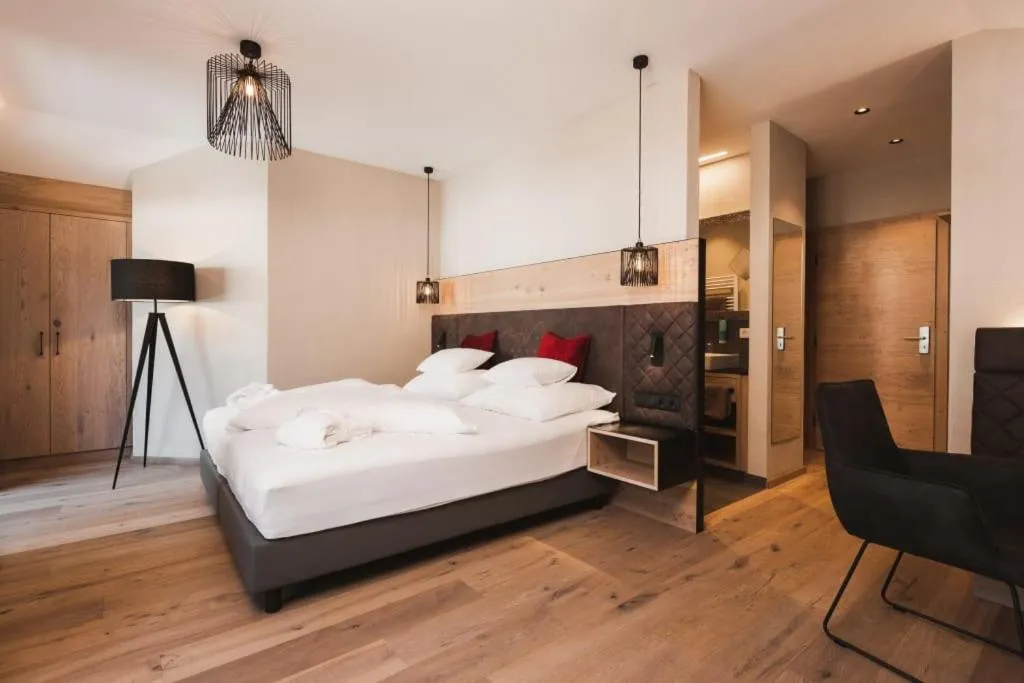 Bed in Hotel Riederhof- Urlaub mit WAU!