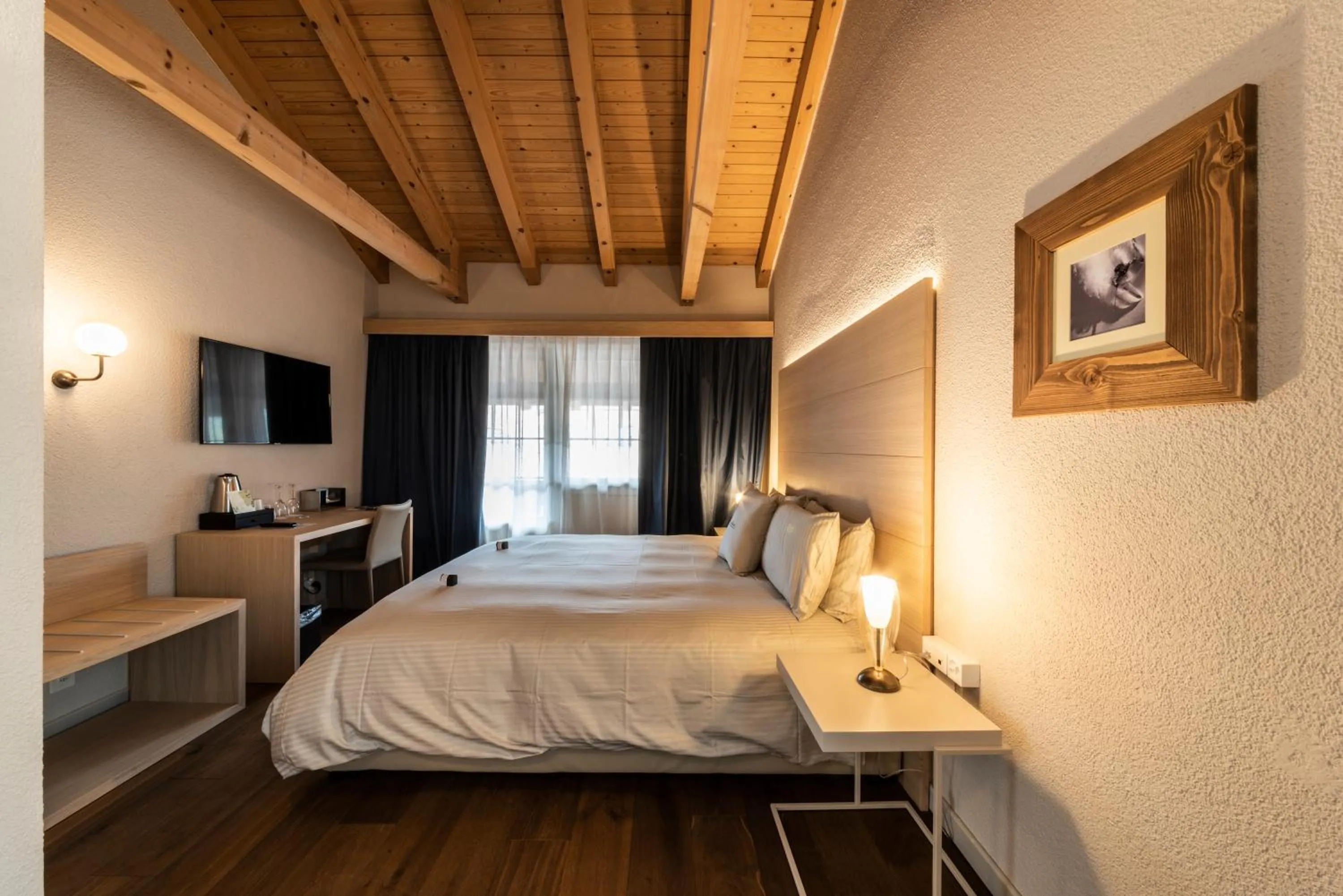 Bed in Hotel Maya Caprice