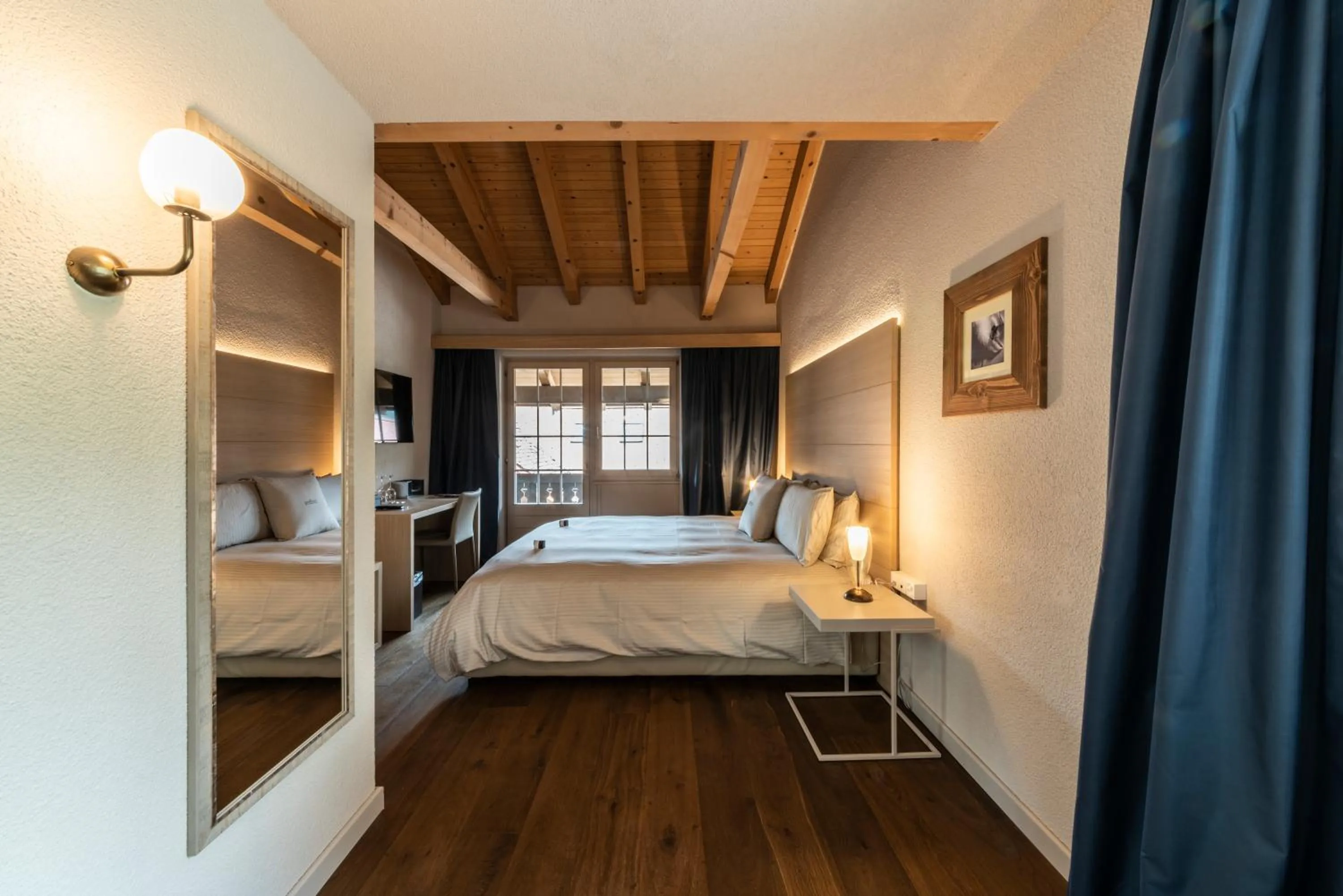 Bed in Hotel Maya Caprice