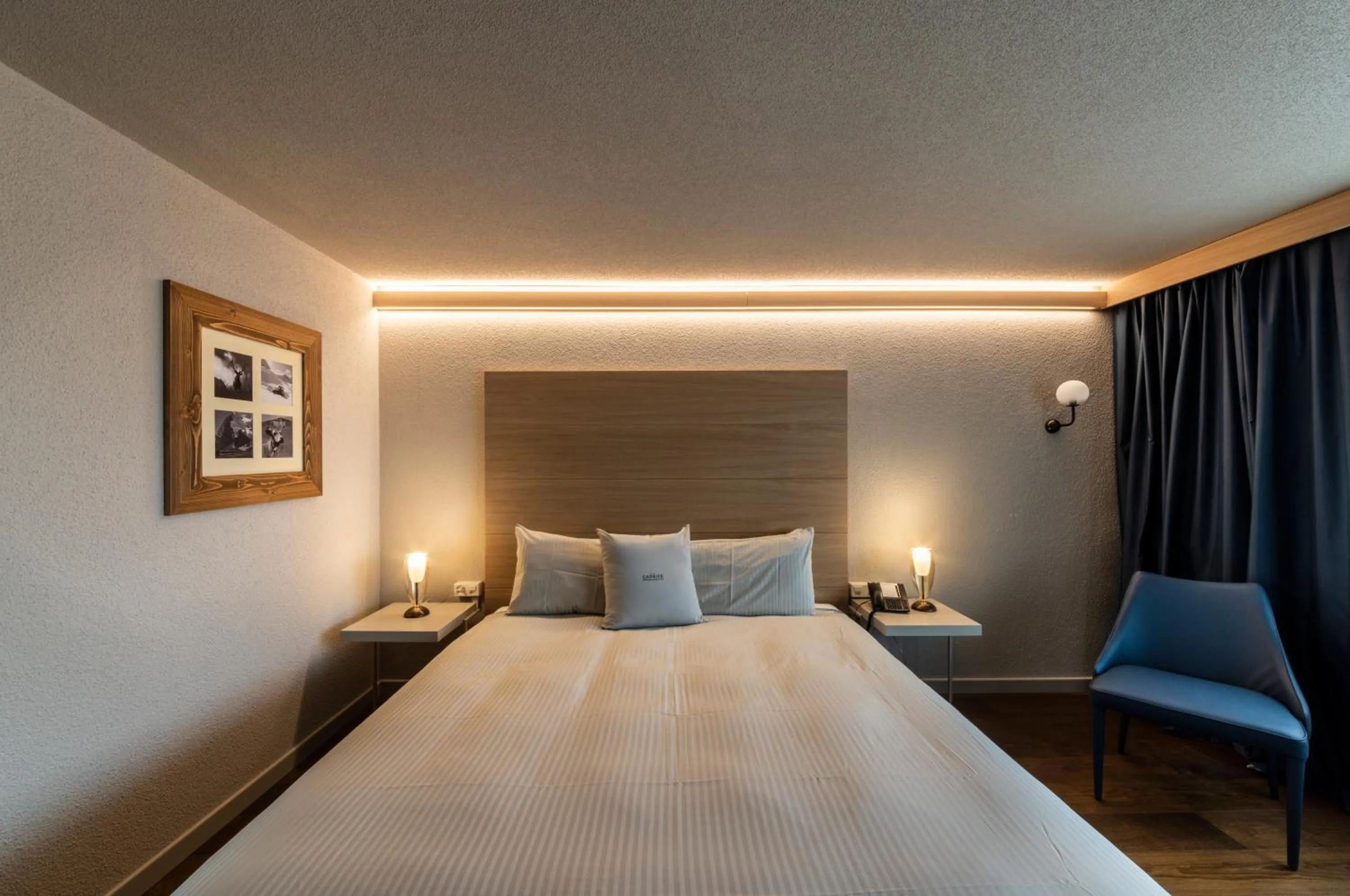 Bed in Hotel Maya Caprice