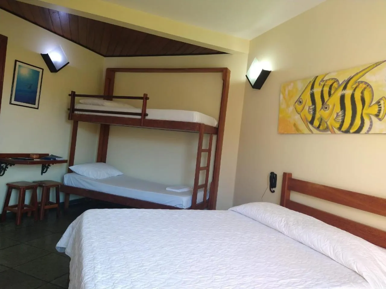 Bed in Pousada Genesis