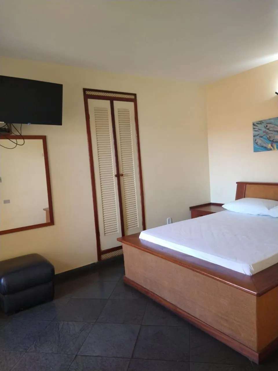 Bed in Pousada Genesis