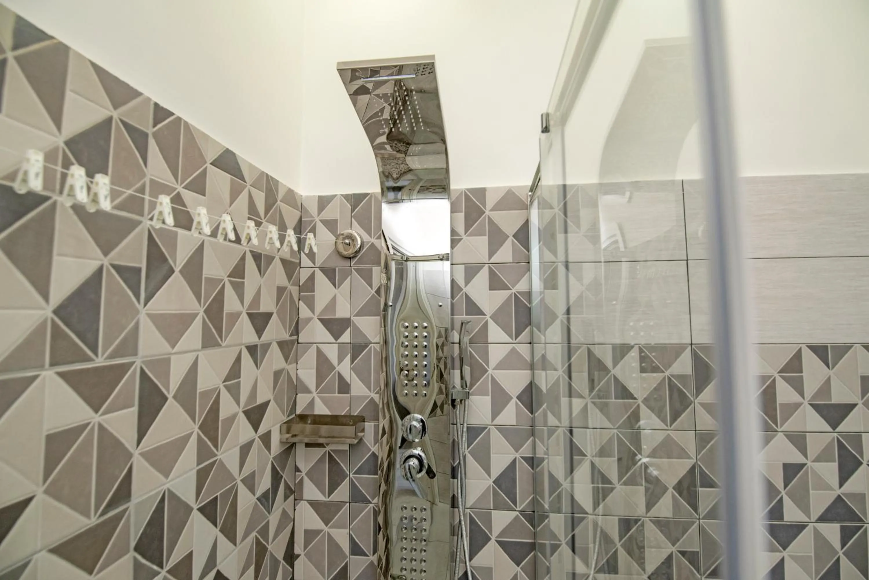 Shower in L'Isola Del Postino Rooms