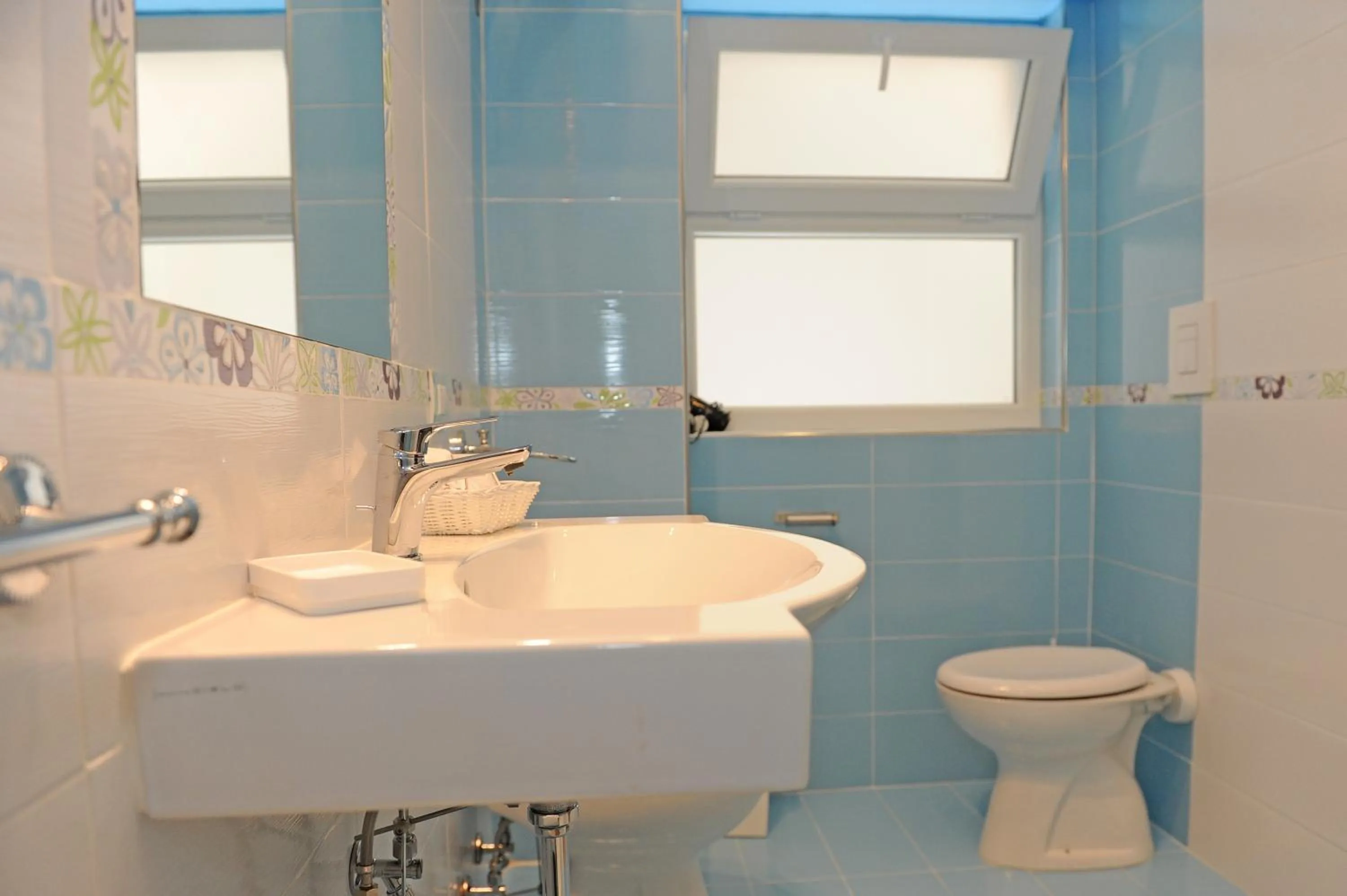 Toilet in L'Isola Del Postino Rooms