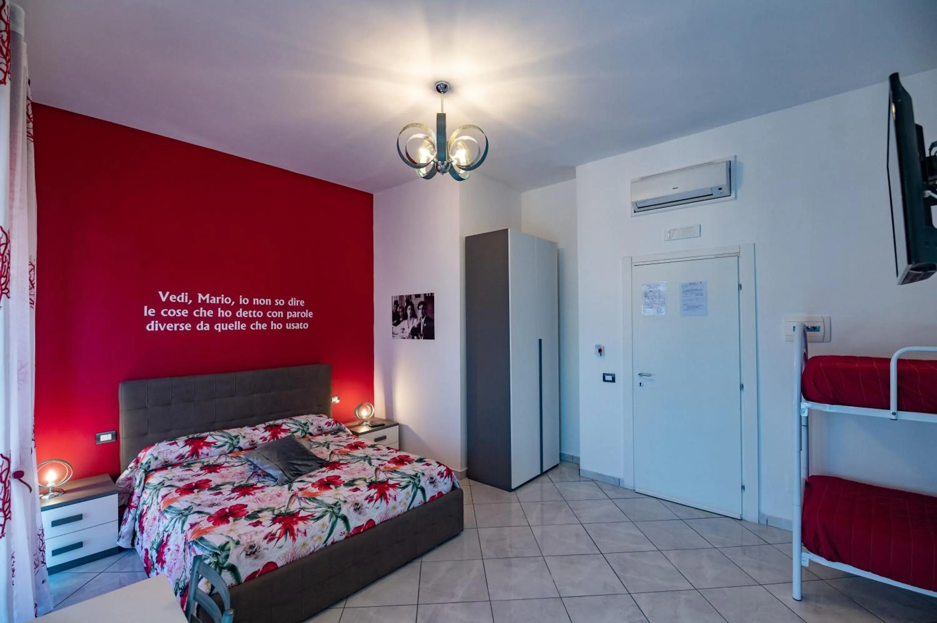 Bed in L'Isola Del Postino Rooms