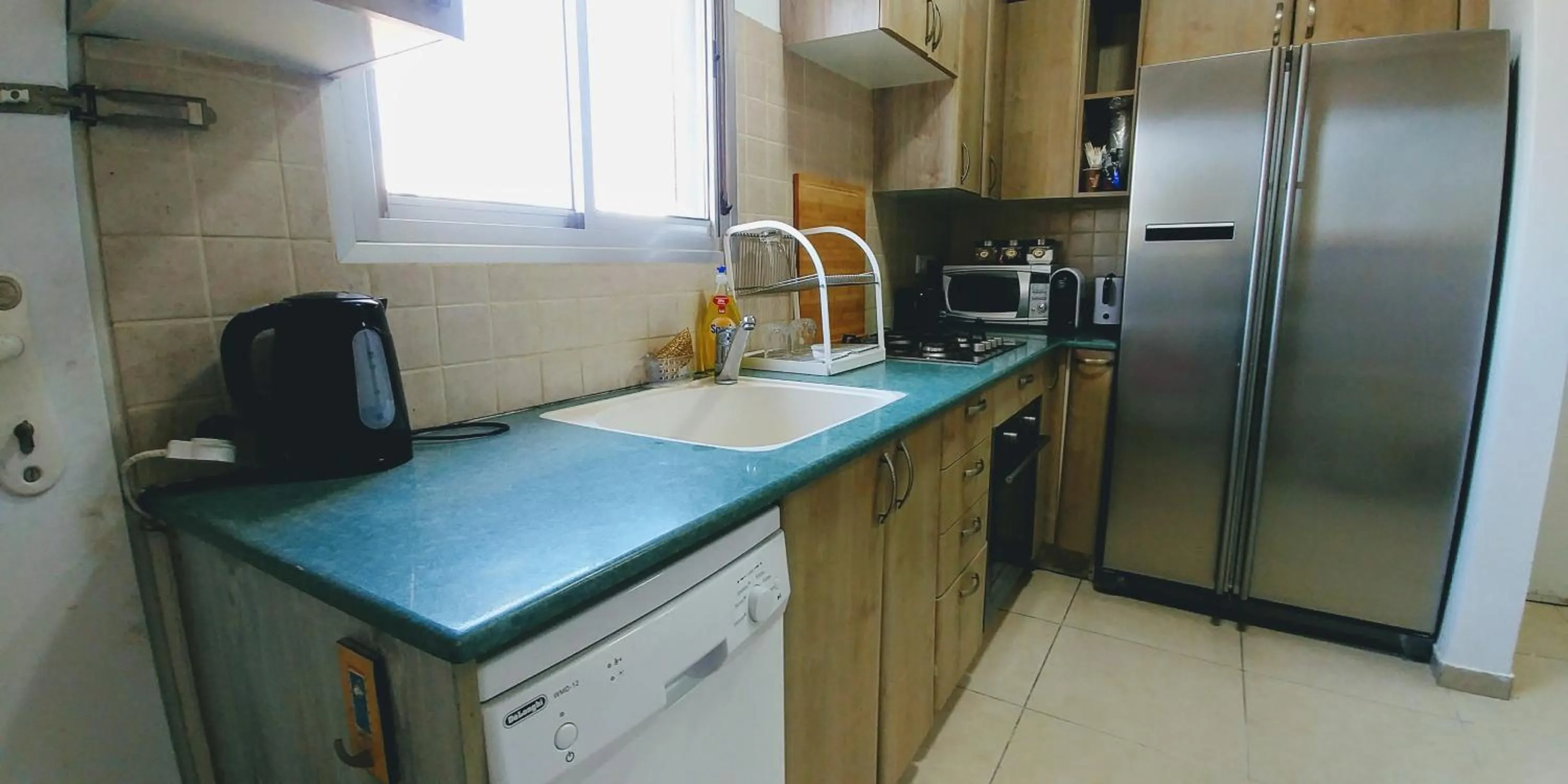 Communal kitchen in Old Jaffa's Penthouse Boutique Hostel