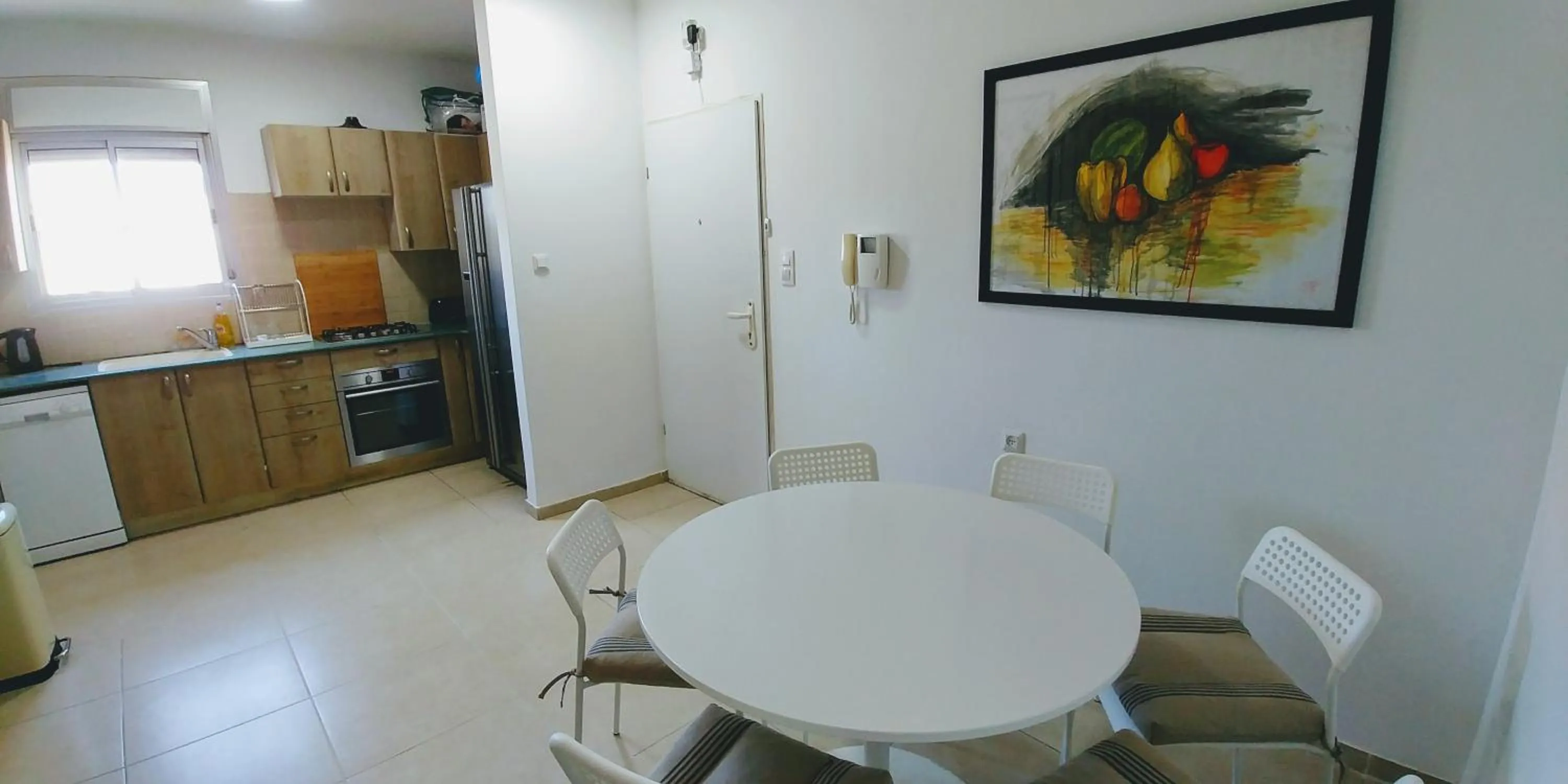 Communal lounge/ TV room in Old Jaffa's Penthouse Boutique Hostel