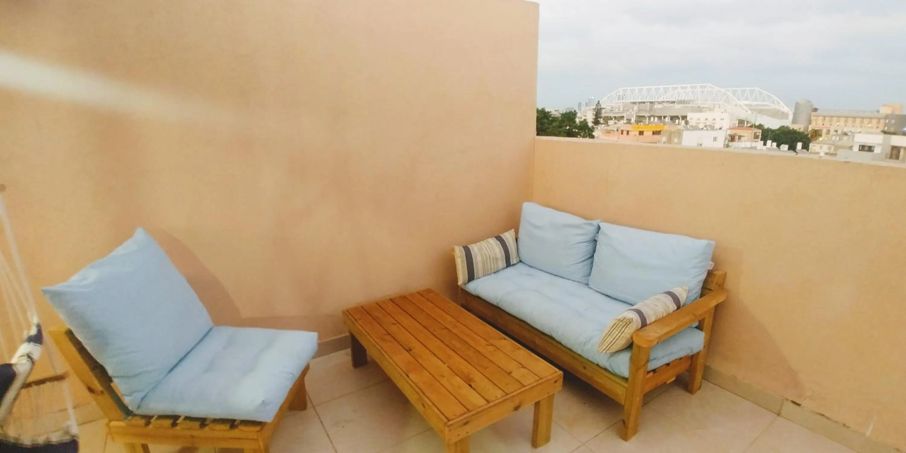 Communal lounge/ TV room in Old Jaffa's Penthouse Boutique Hostel