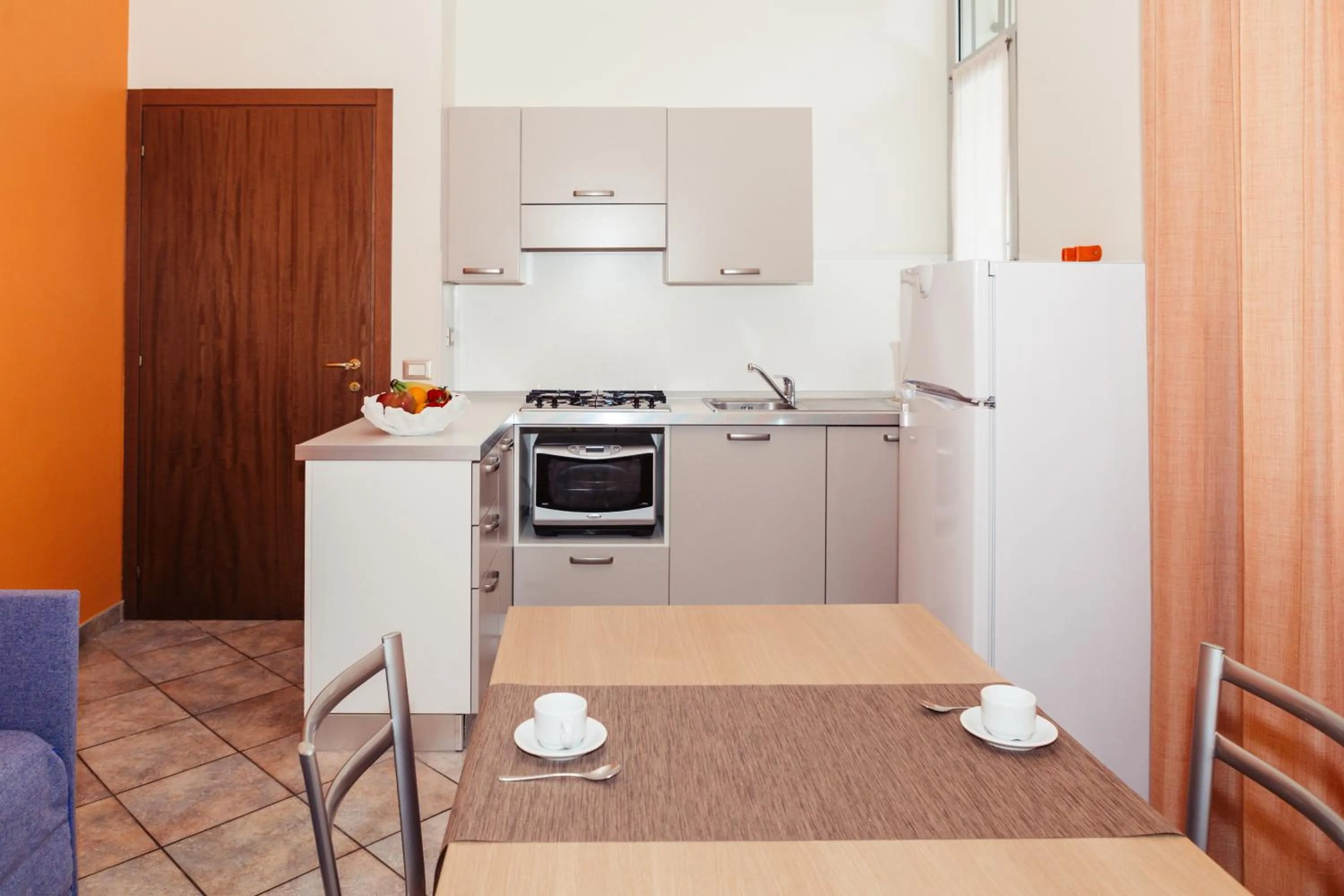 Kitchen or kitchenette in Residence Greco